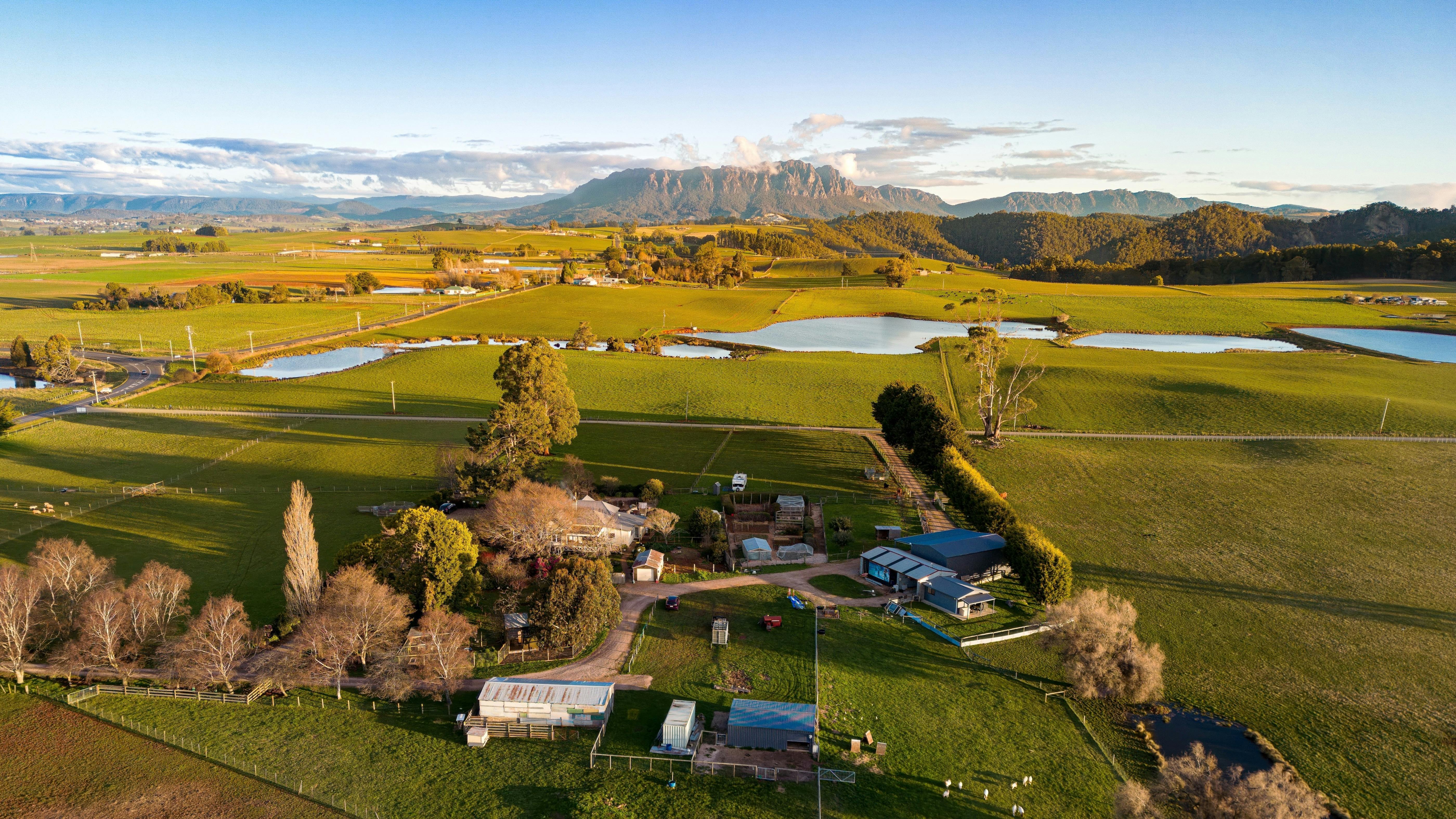 Aerial view of Glencoe Country Bed and Breakfast with Mount Roland beyond