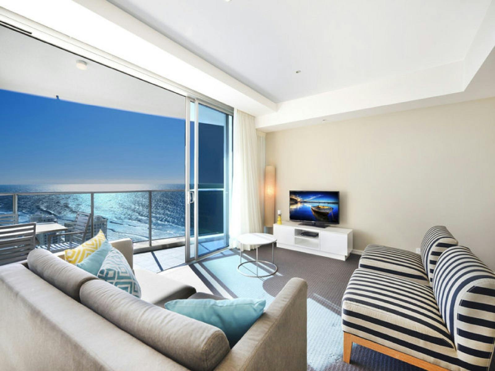 Lounge room with TV, amazing ocean views overlooking balcony Hilton Residences Surfers Paradise - Lounge room with TV, amazing ocean views overlooking balcony Hilton Residences Surfers Paradise -