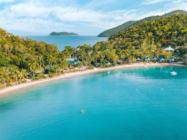 Wide shot of island with beach. Wide shot of island with beach.