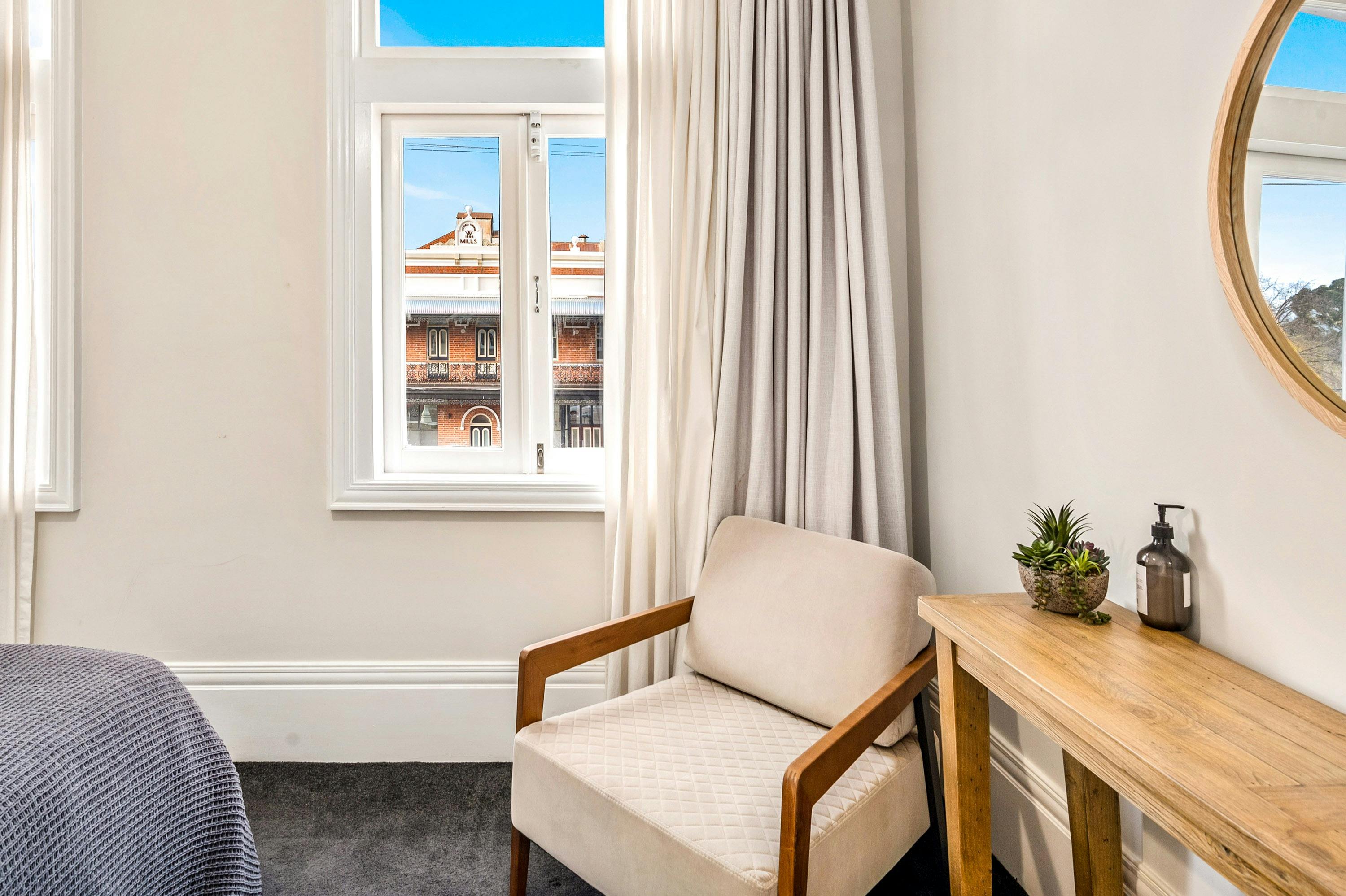 armchair in master bedroom