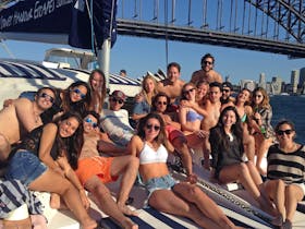Sydney boat party on front deck photo