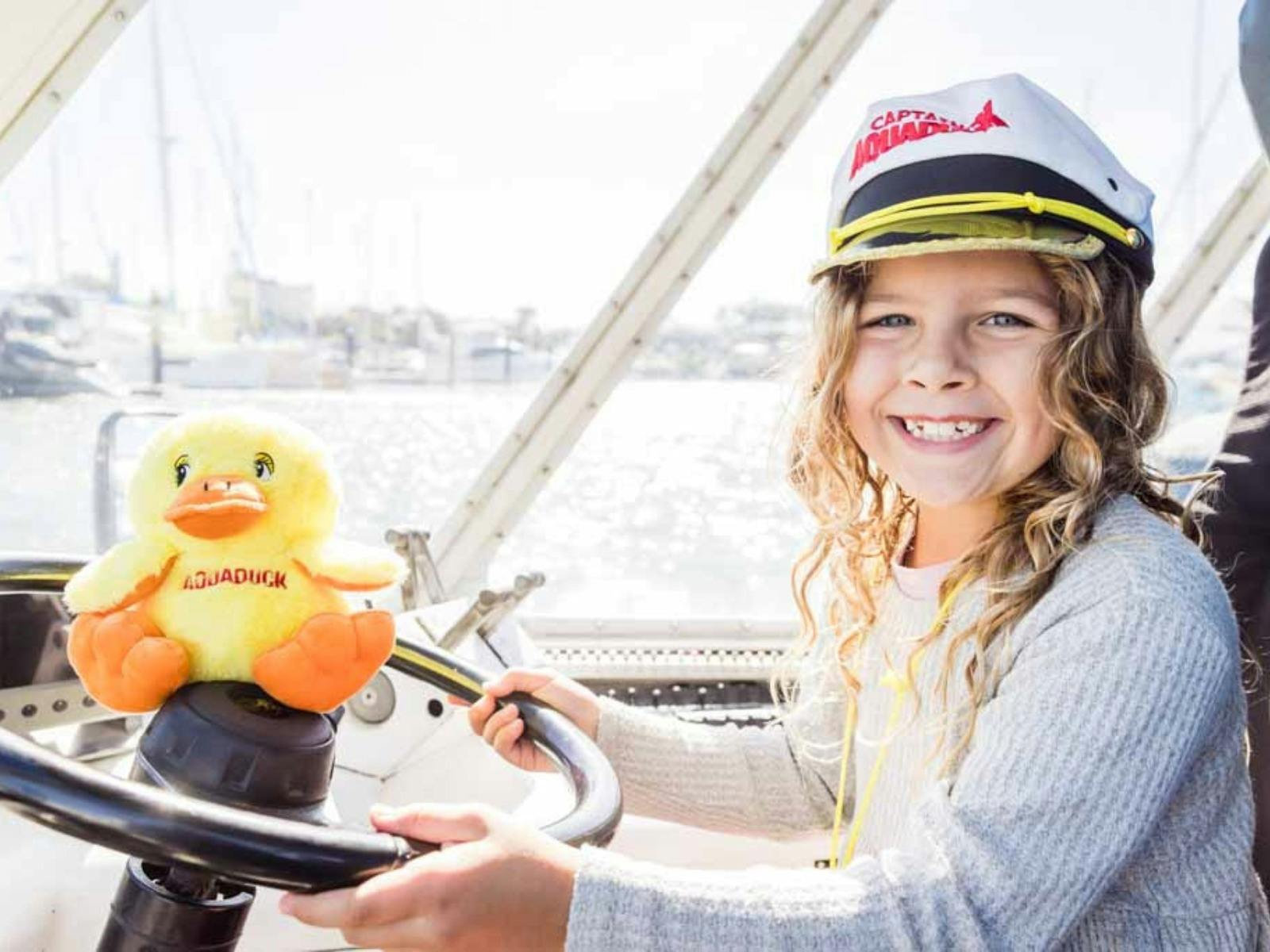 Girl driving the duck