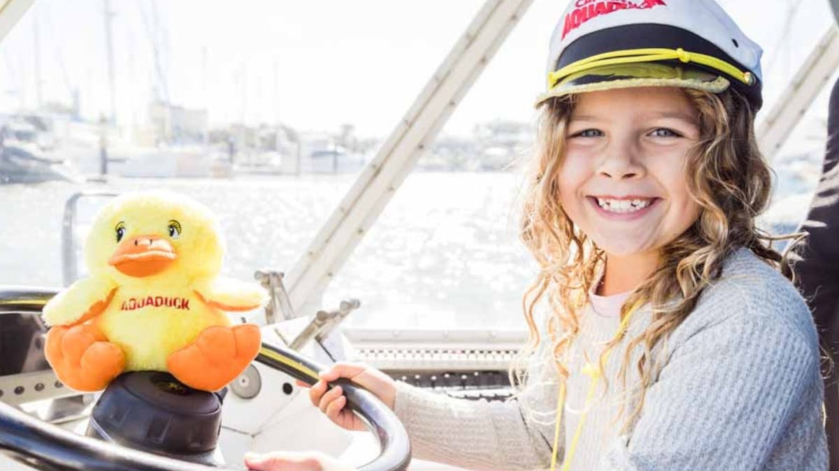 Girl driving the duck