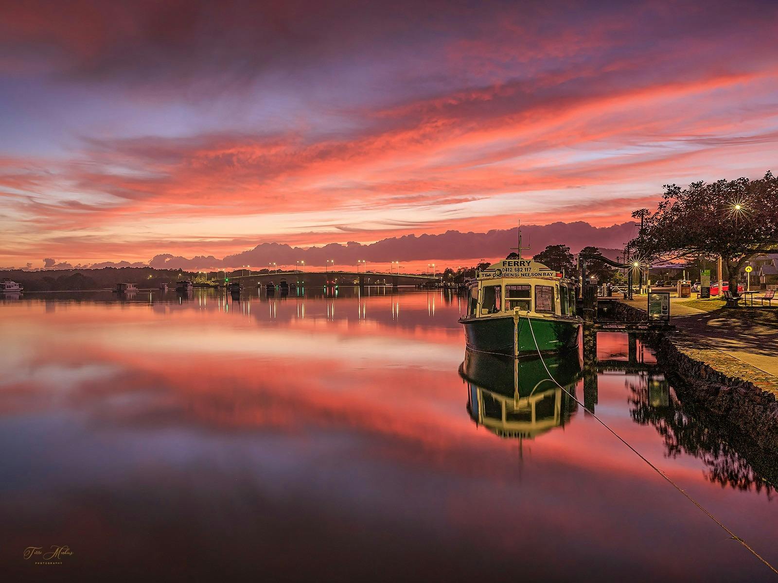 The MV Wallamba anchored in Tea Gardens, NSW, during sunset.