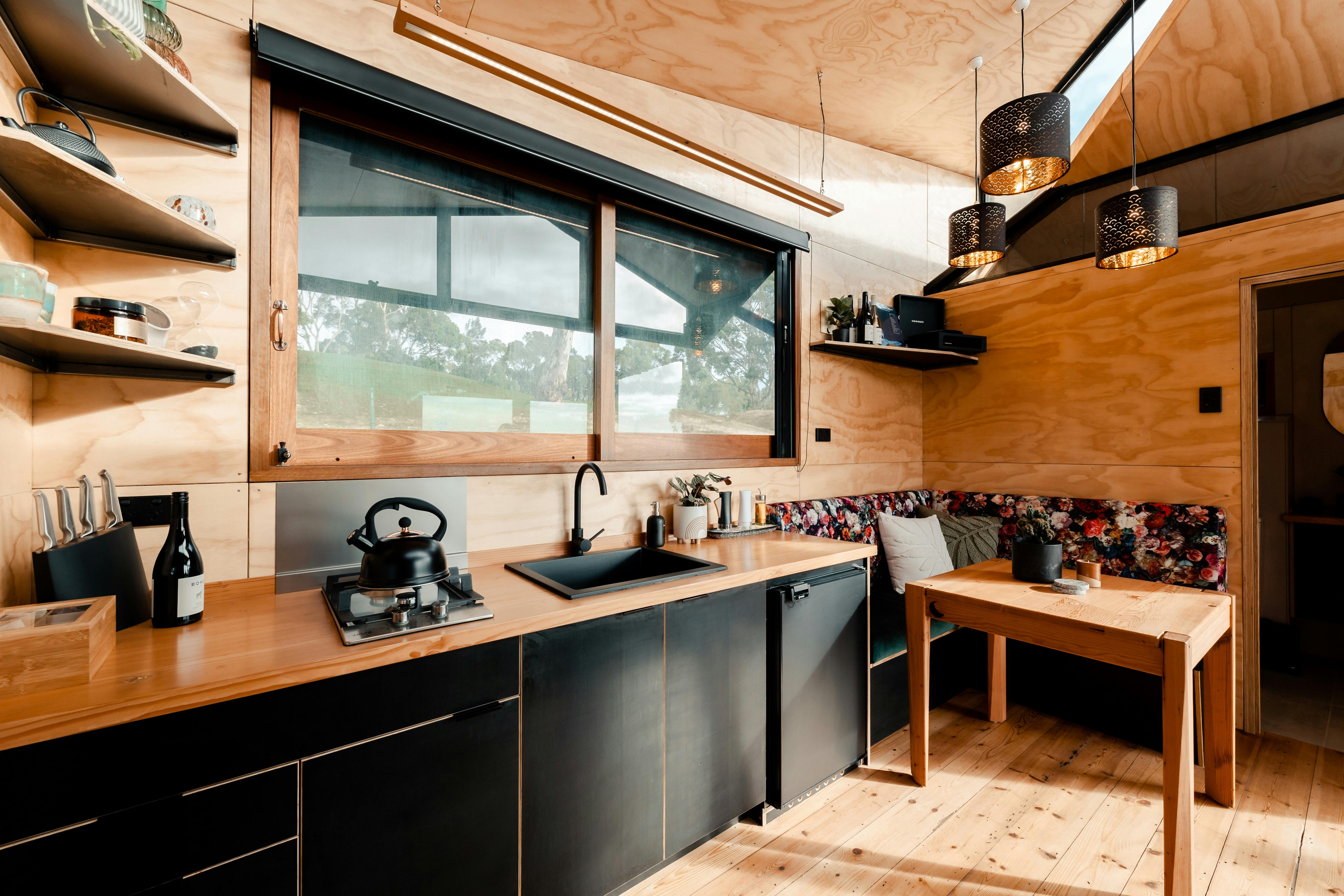 Kitchen and dining space is designed to maximse views out over the city