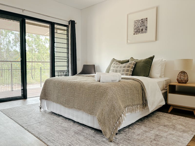 Spacious unit sizes featuring private veranda and queen bed.