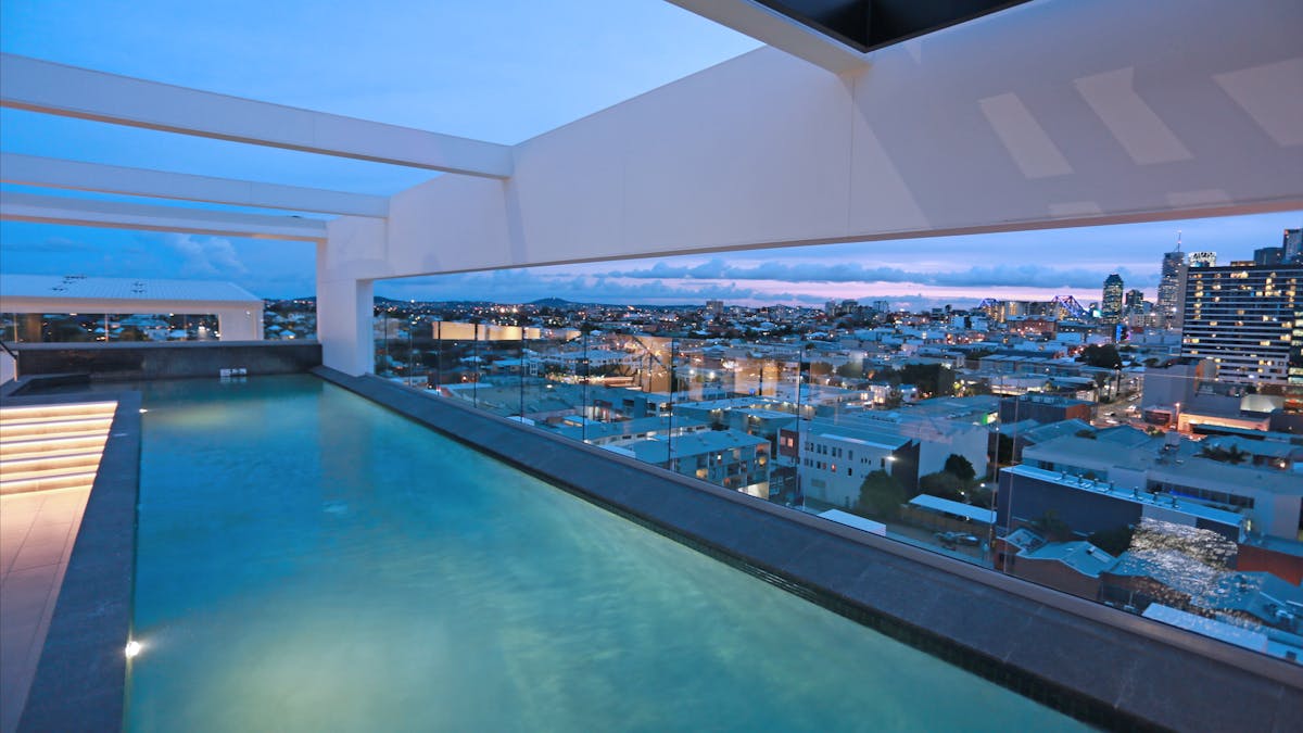 Heated Rooftop Lap Pool with views of the city