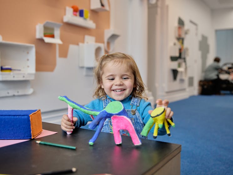 child playing in Kids Gallery, Susie Losch: Shelfie