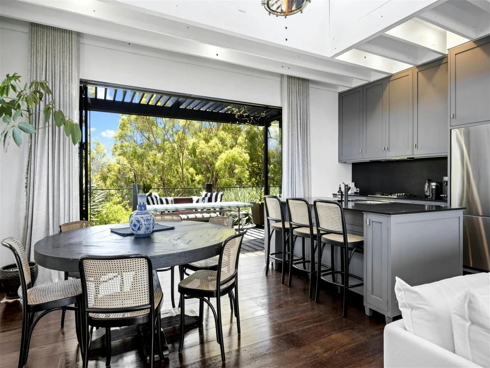 Dining and kitchen areas, creating a perfect setting for meals and relaxation