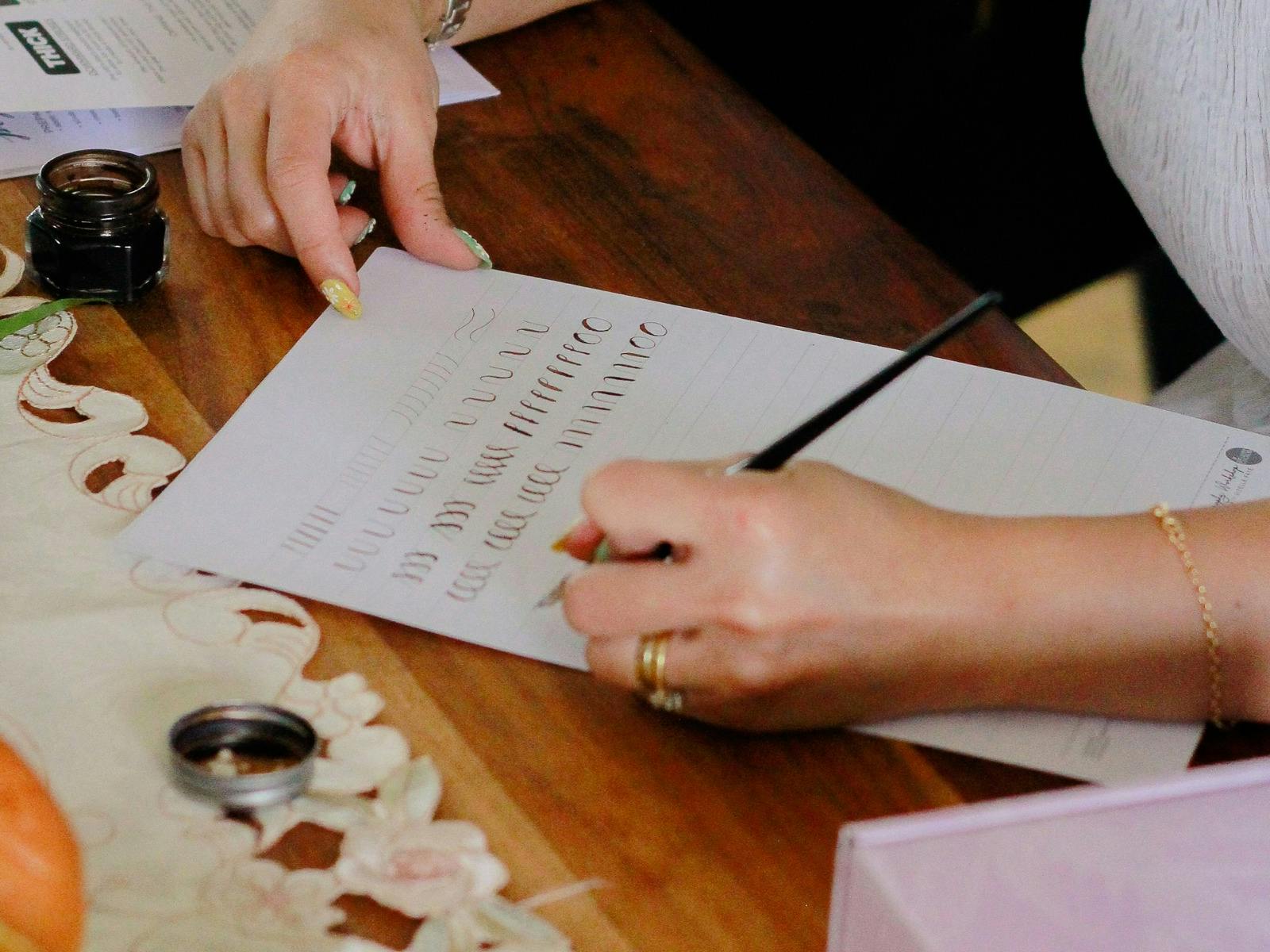 practising calligraphy lettering