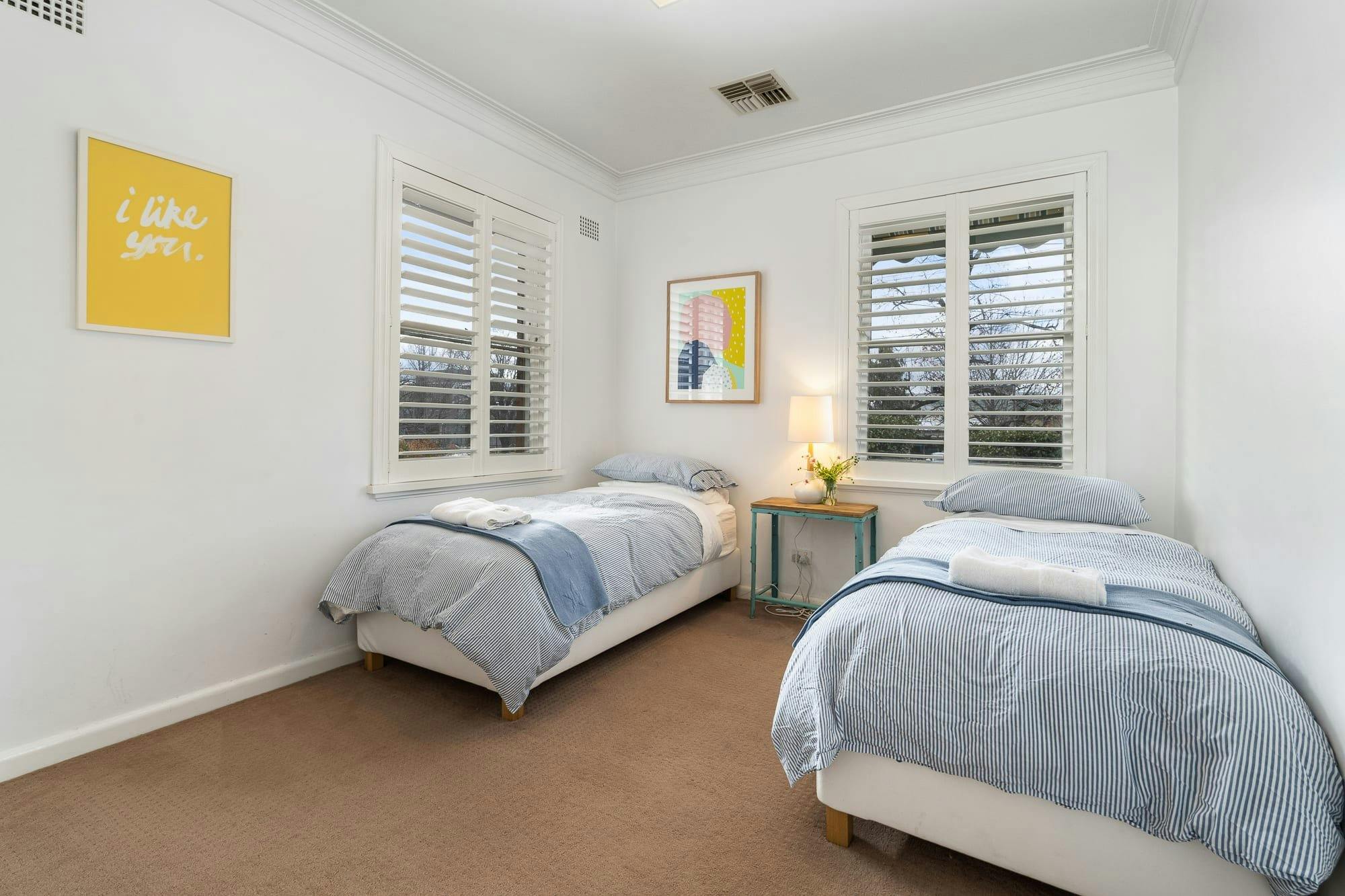 2 King Singles with 2 windows with garden views. Perfect for 2 kids.