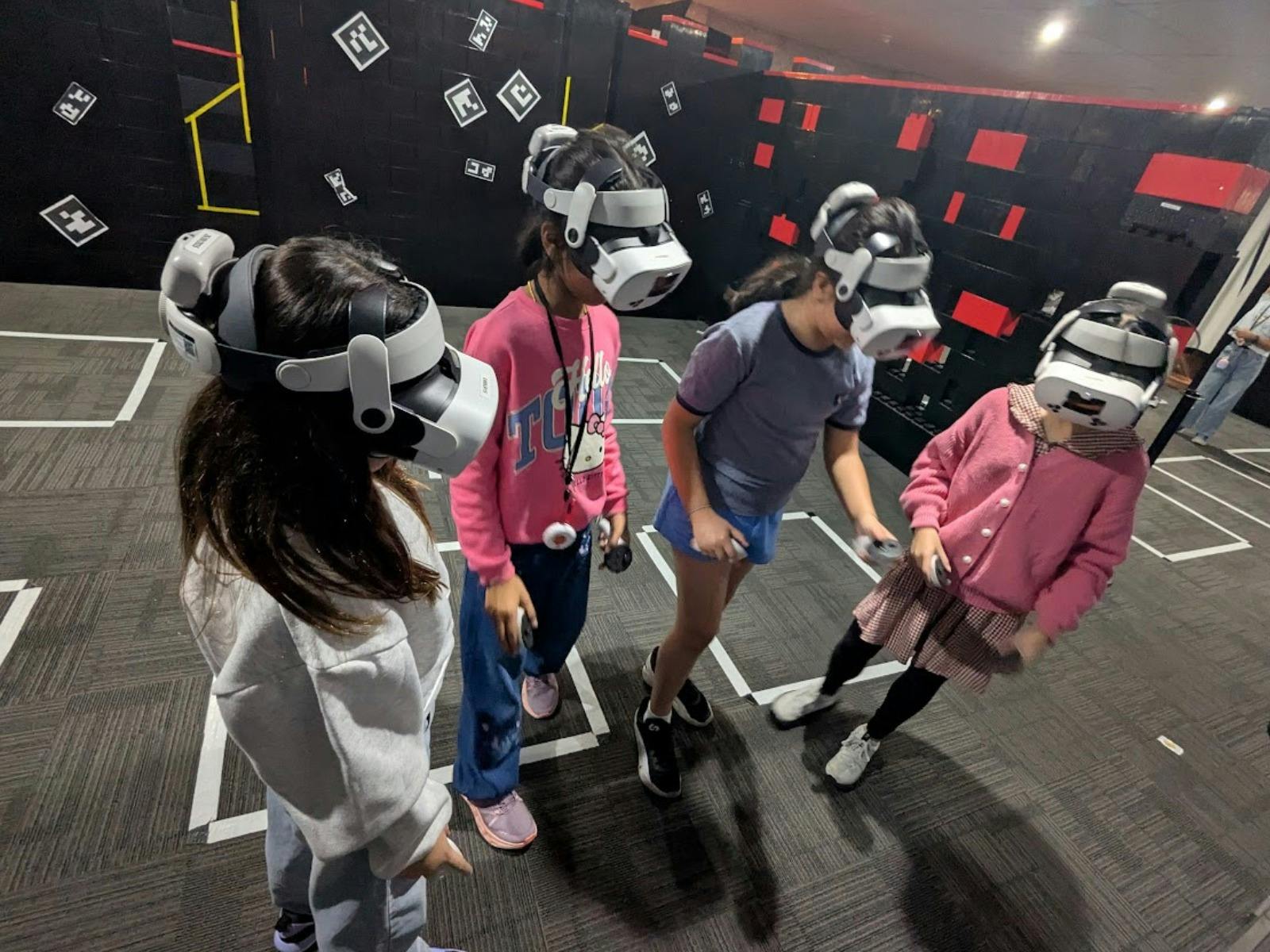 Players interacting with a free roam virtual reality game