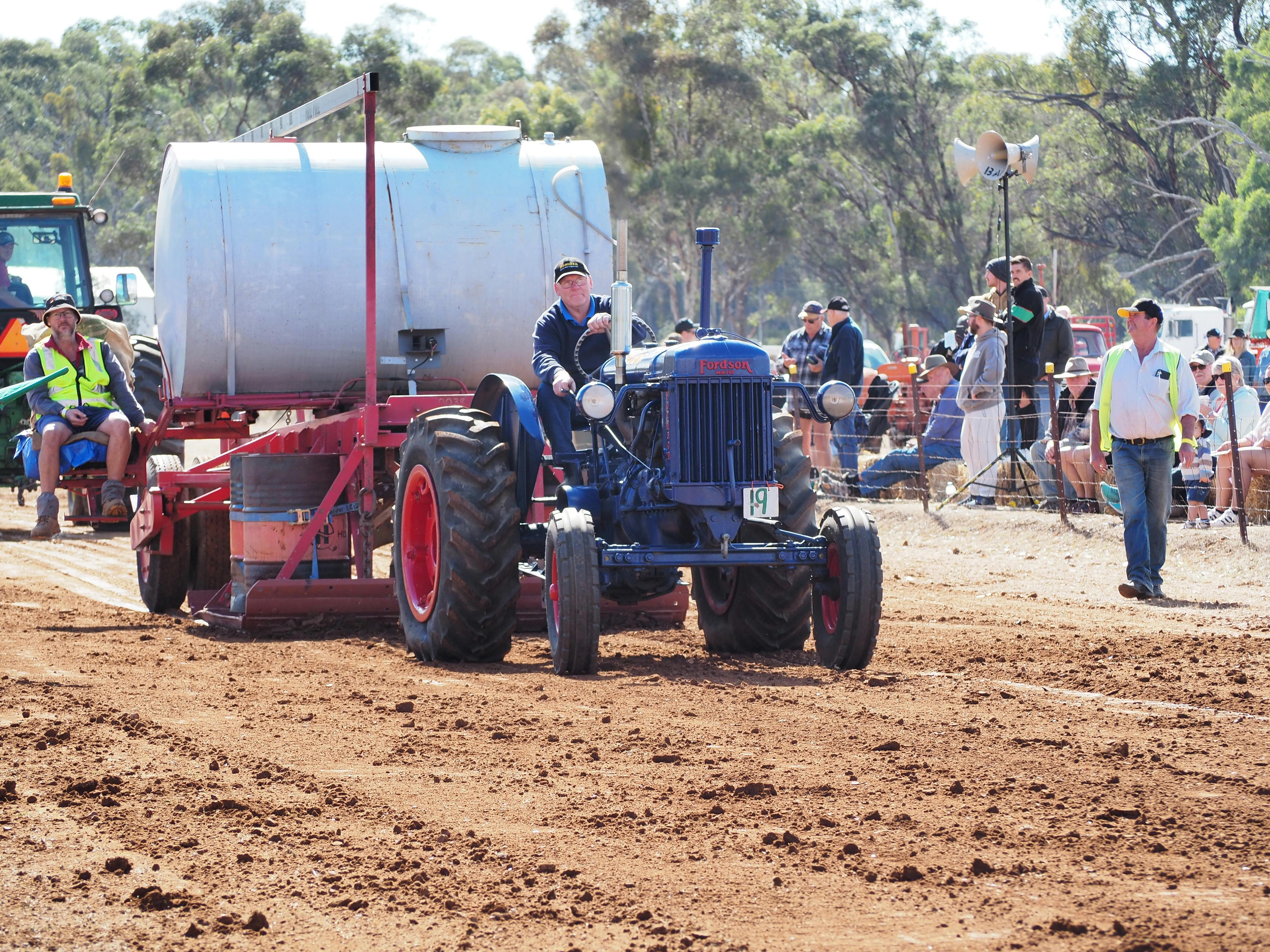 tractor pulling a heavy sled in a competition