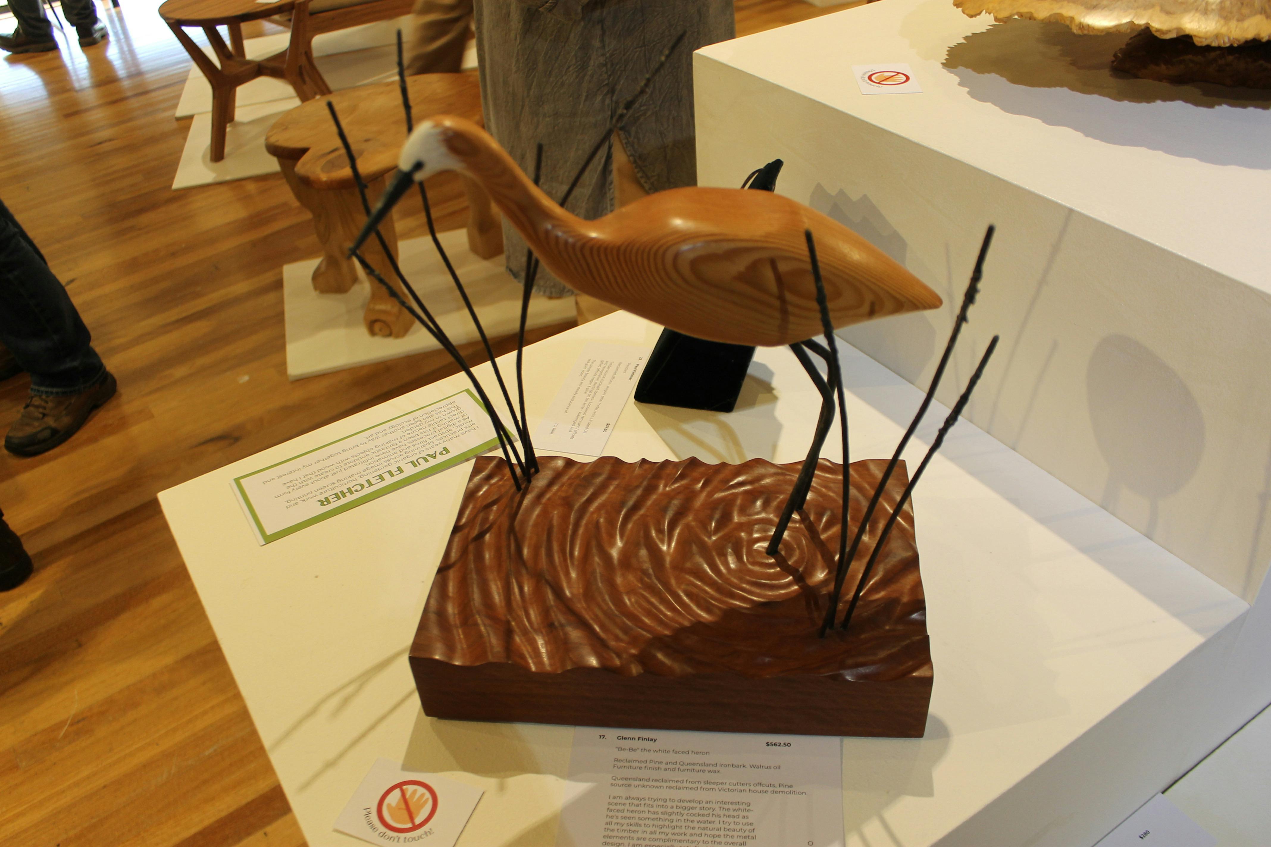 Wooden bird sculpture
