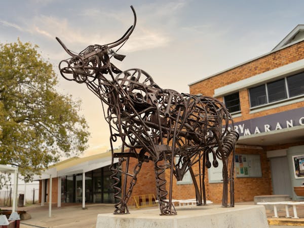 A metal sculpture of a bull, made of pieces of scrap metal welded together A metal sculpture of a bull, made of pieces of scrap metal welded together