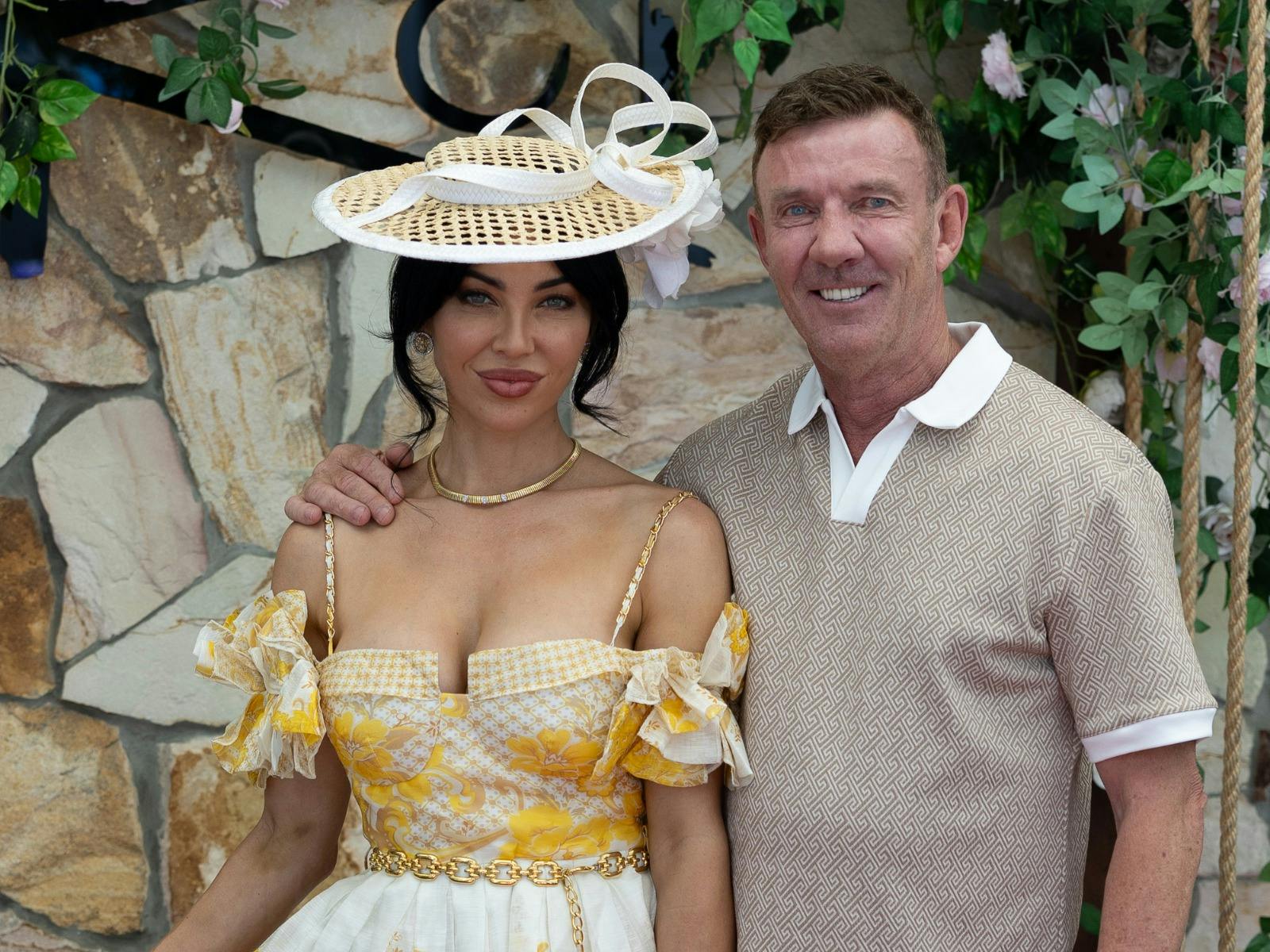 A couple enjoying the best melbourne cup event in broadbeach at Koi