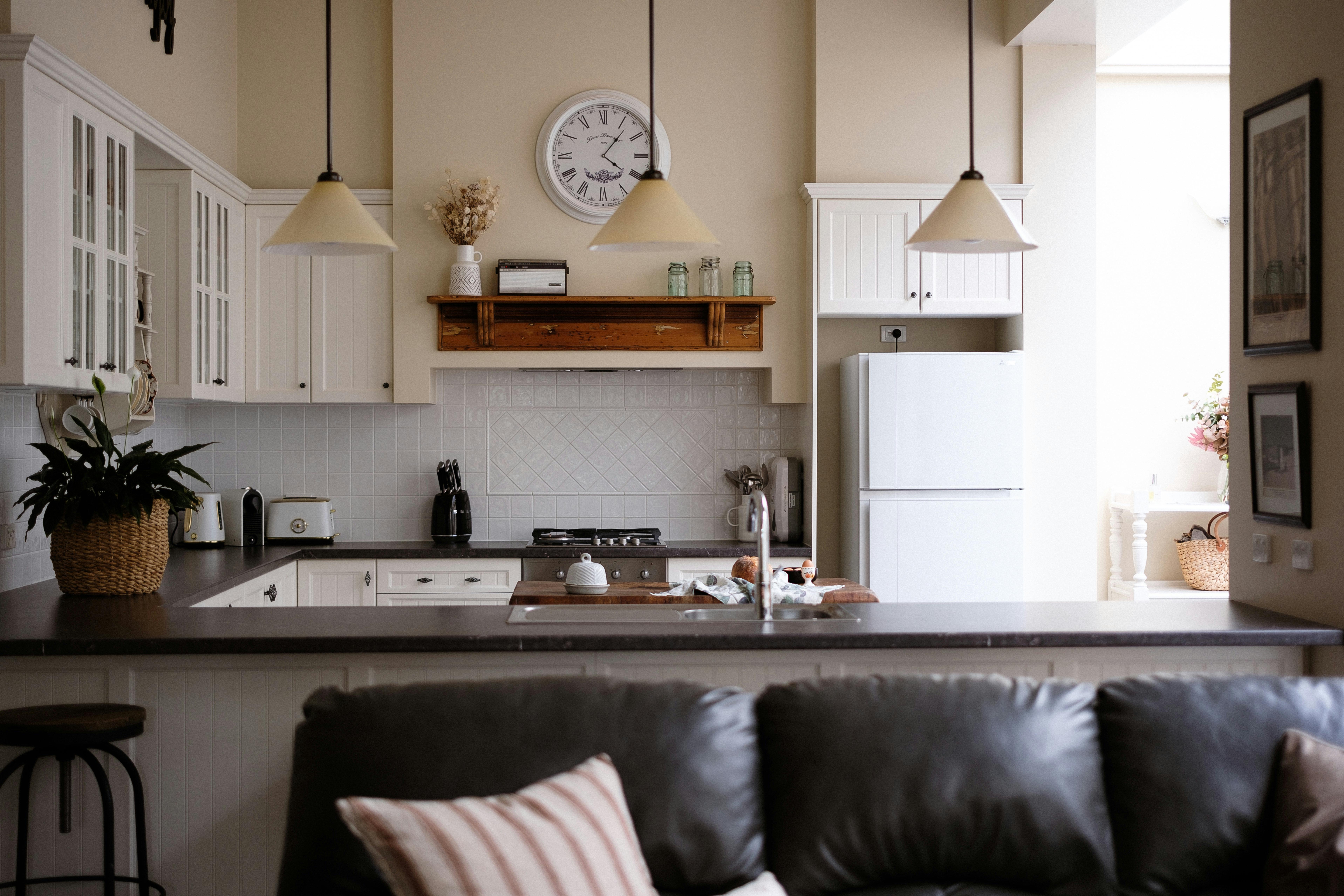 Lounge room looking into a kitchen