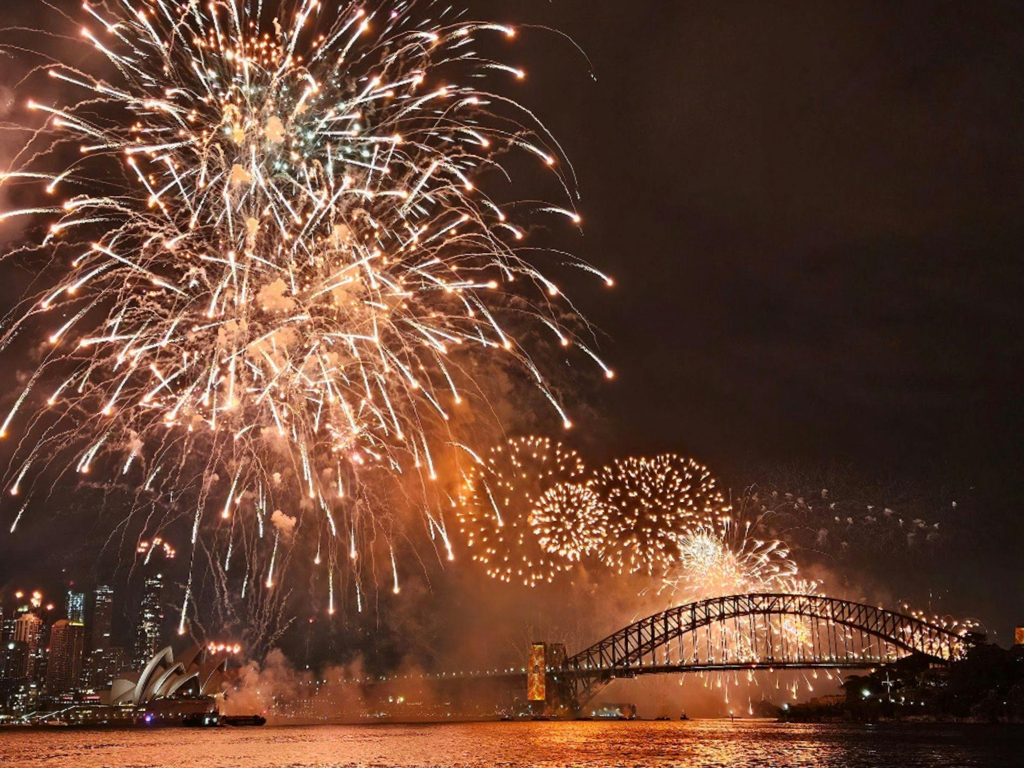 Fireworks over the Sydney Harbour Bridge and Opera House on New Year's Eve