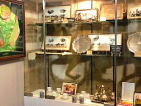 This is a collection of trophies, photos and memorabilia donated by Bill and Evelyn Stanley.