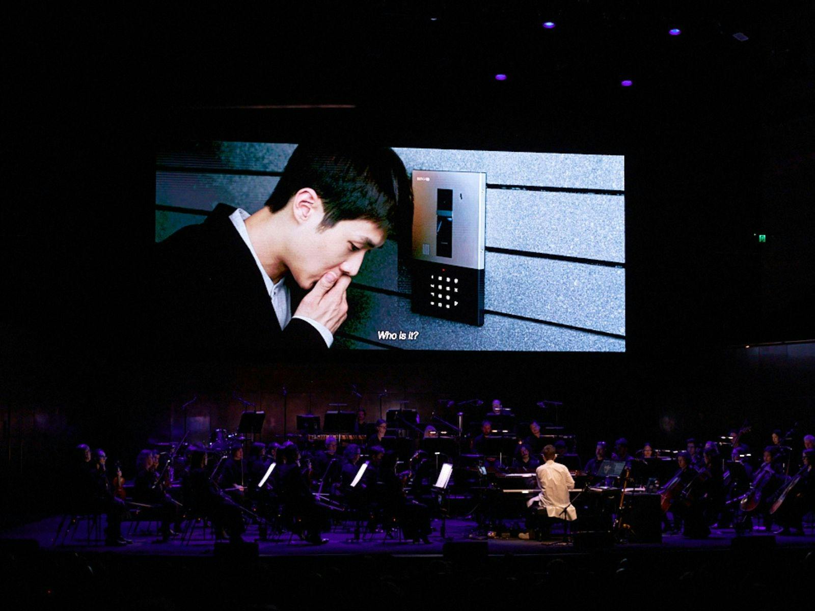 Parasite plays on the big screen as orchestra plays along