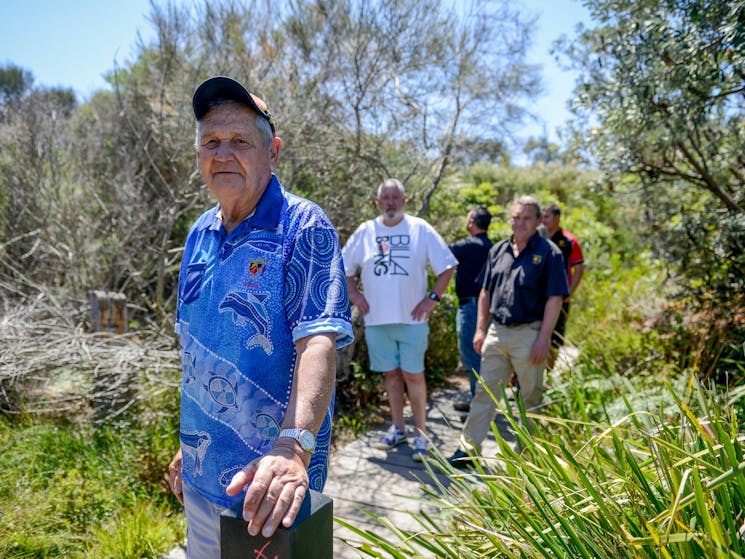 Fred Carriage takes a tour group for a walk along the Coomee Nulunga Cultural Track