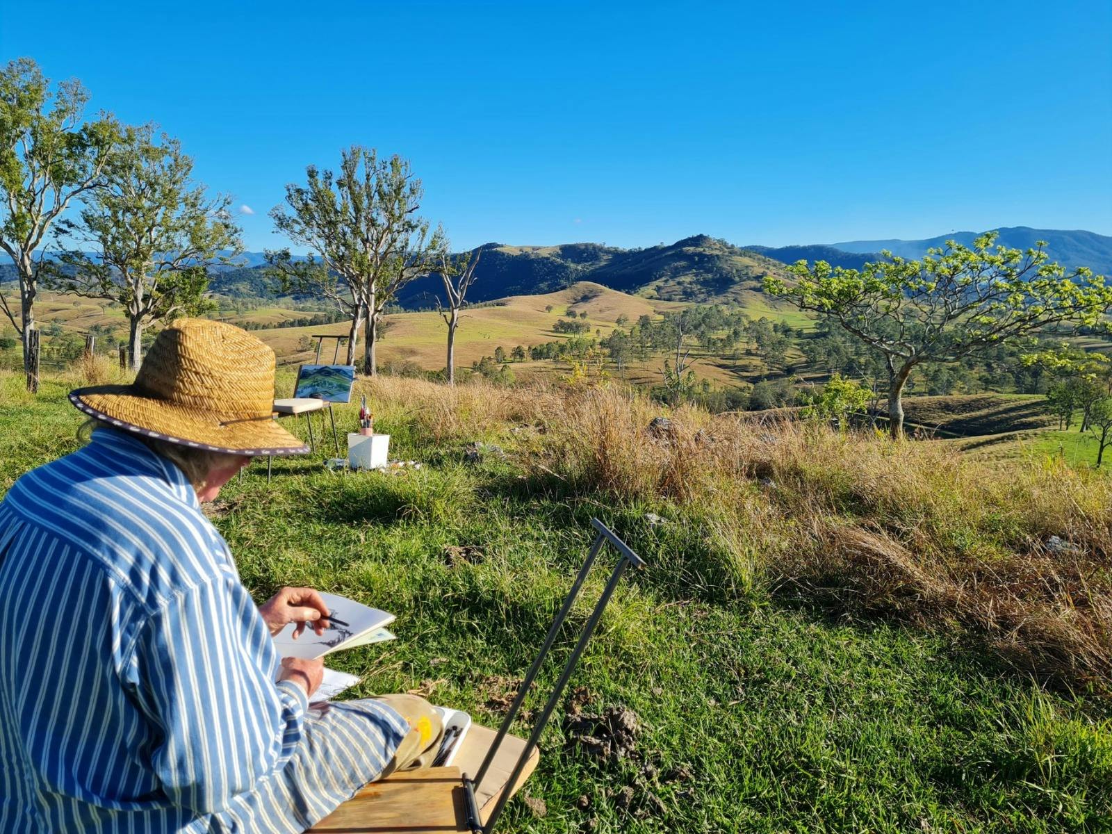An artist on residency at Coombadjha Art Studio and Gallery