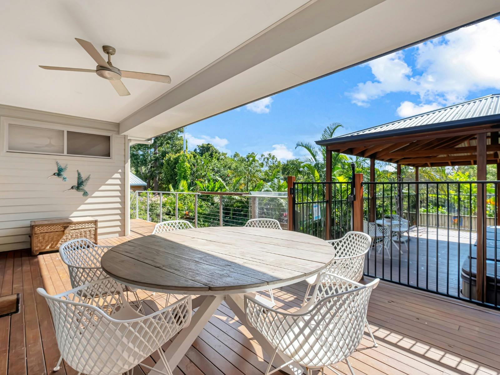 Balcony with outdoor dining and park views