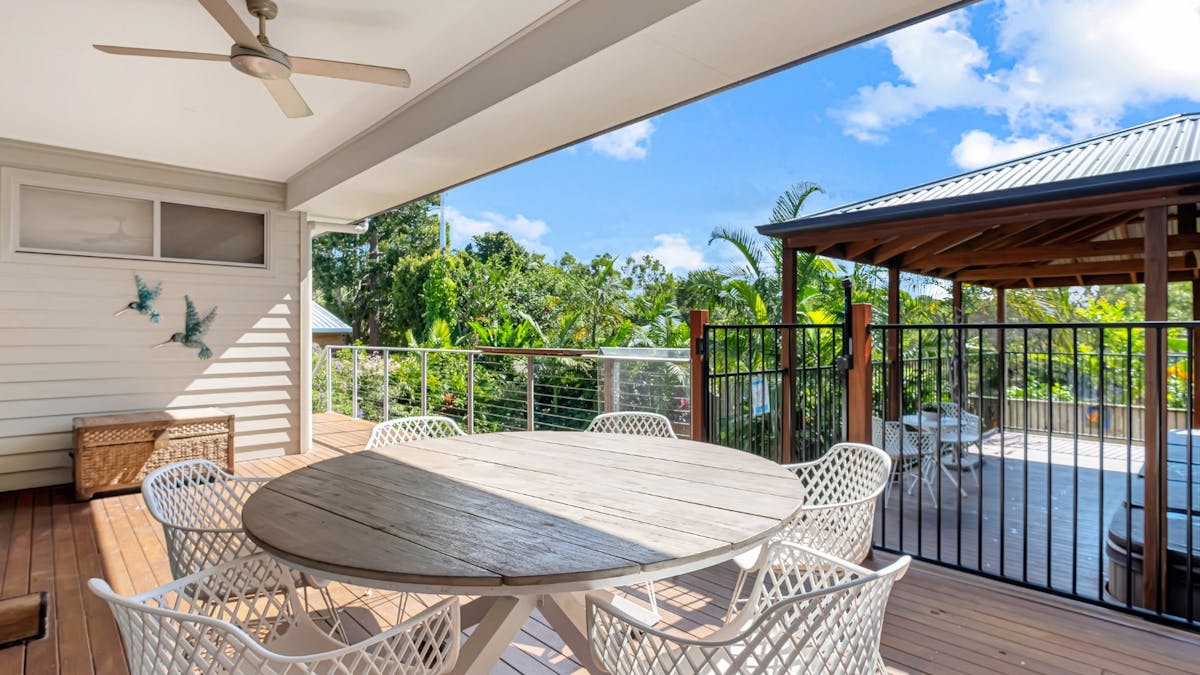 Balcony with outdoor dining and park views
