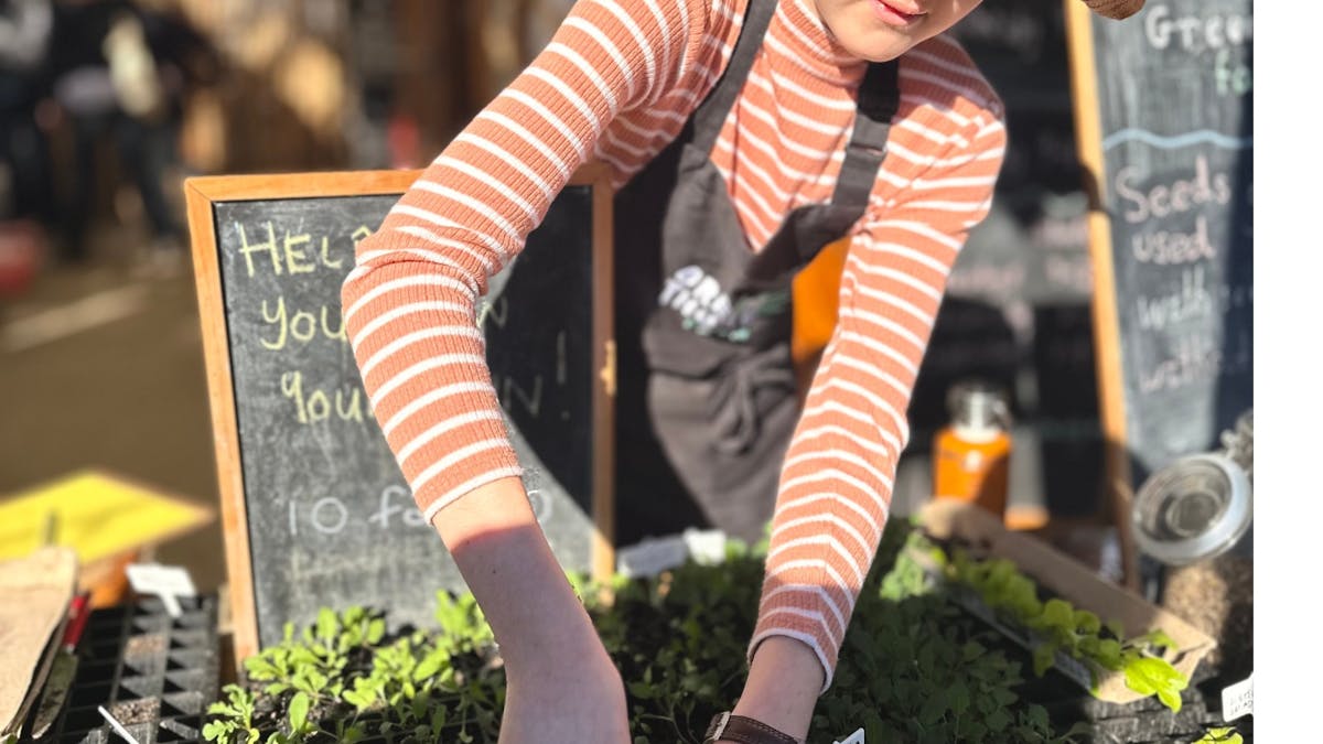 Person selling seedlings at our nursery