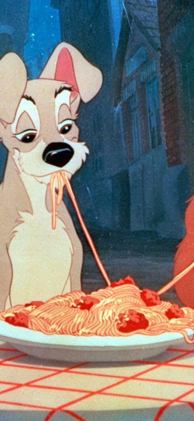 Animation of two dogs eating spaghetti together