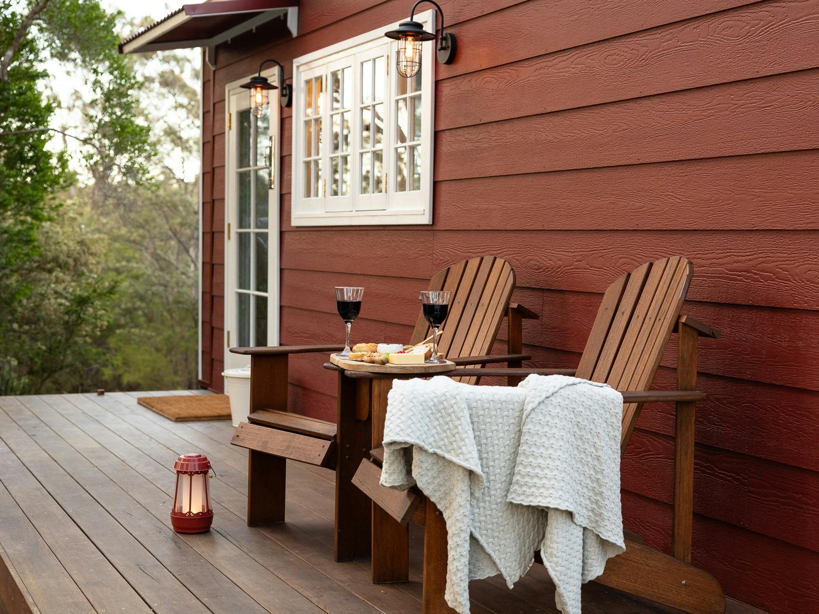 Deck with platter and wine with seating.