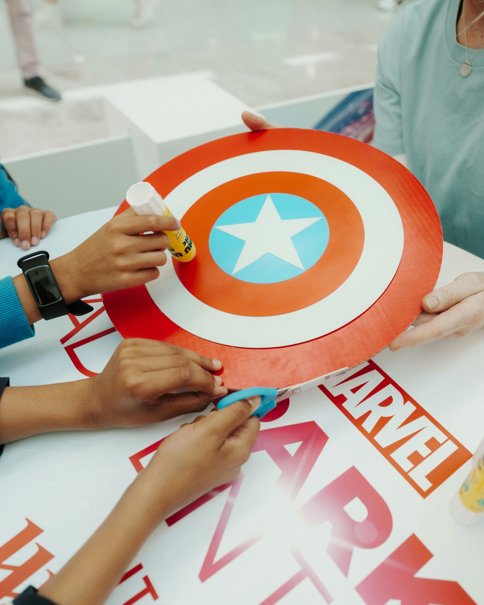 Image of kids creating Captain America shield