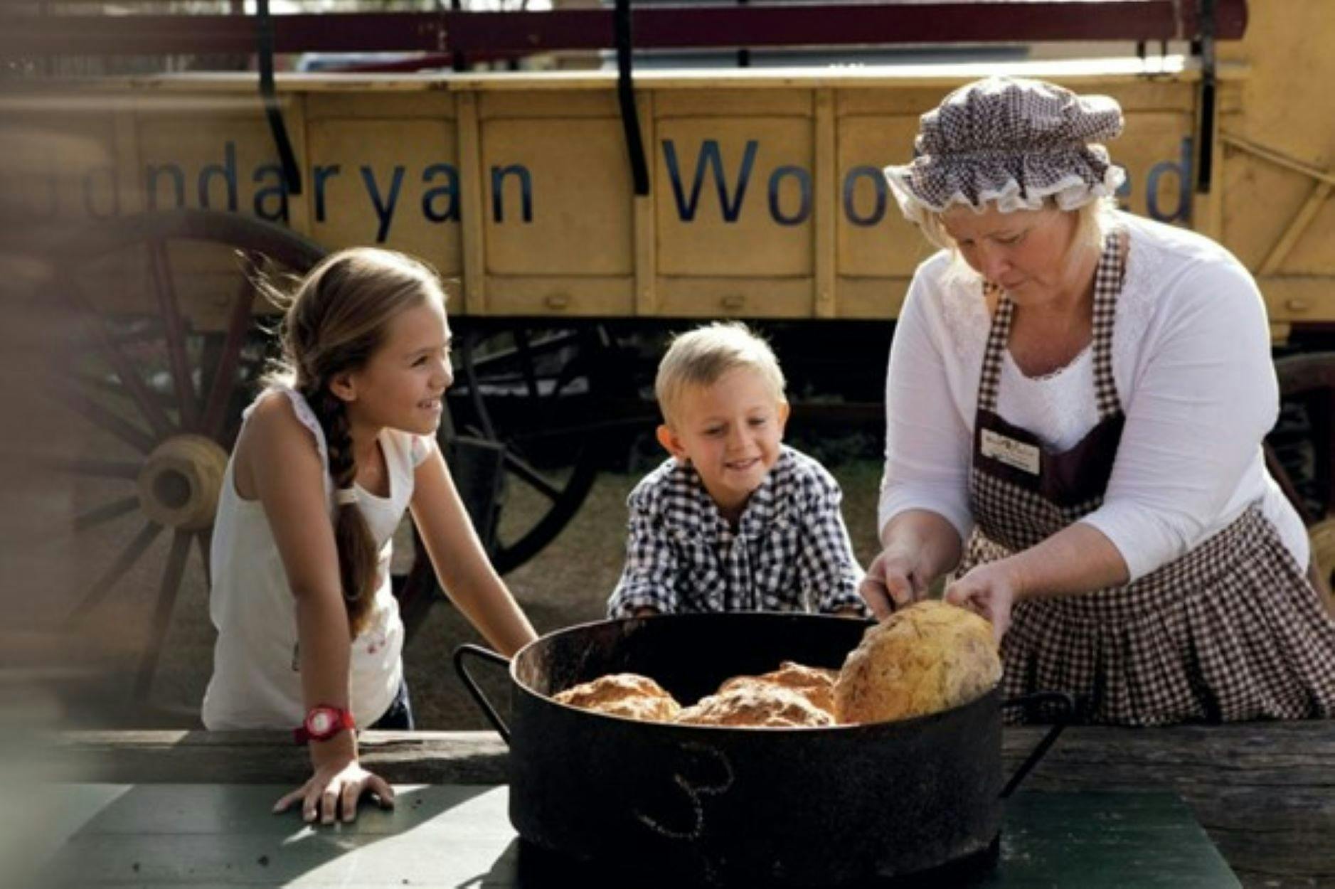 Lady making damper at the Jondaryan Woolshed