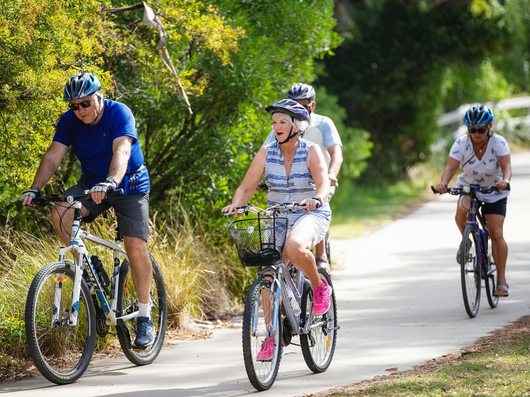 Holiday makers ride bikes
