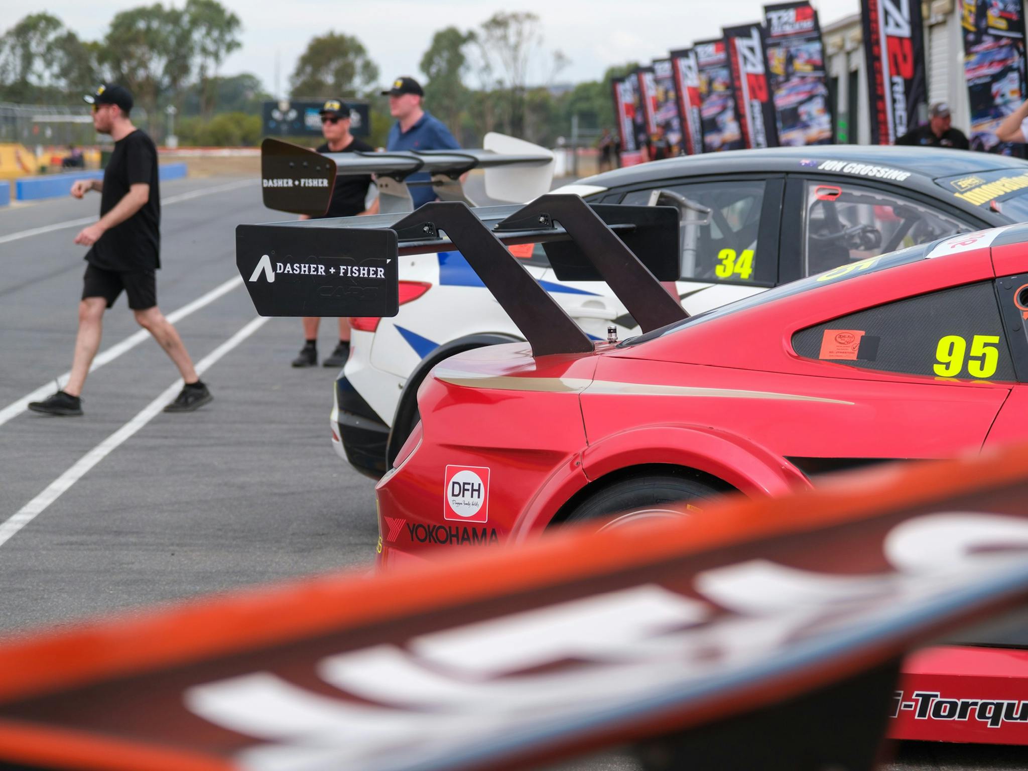 Cars parked up on pit lane garage