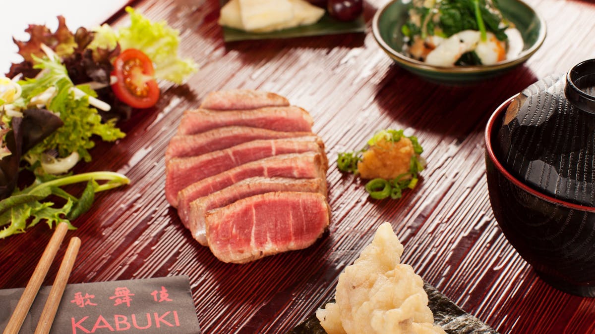 Kabuki food laid out on a plate with wagyu beef in the middle