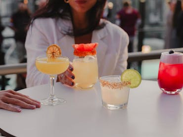 Cocktails arrayed on a table