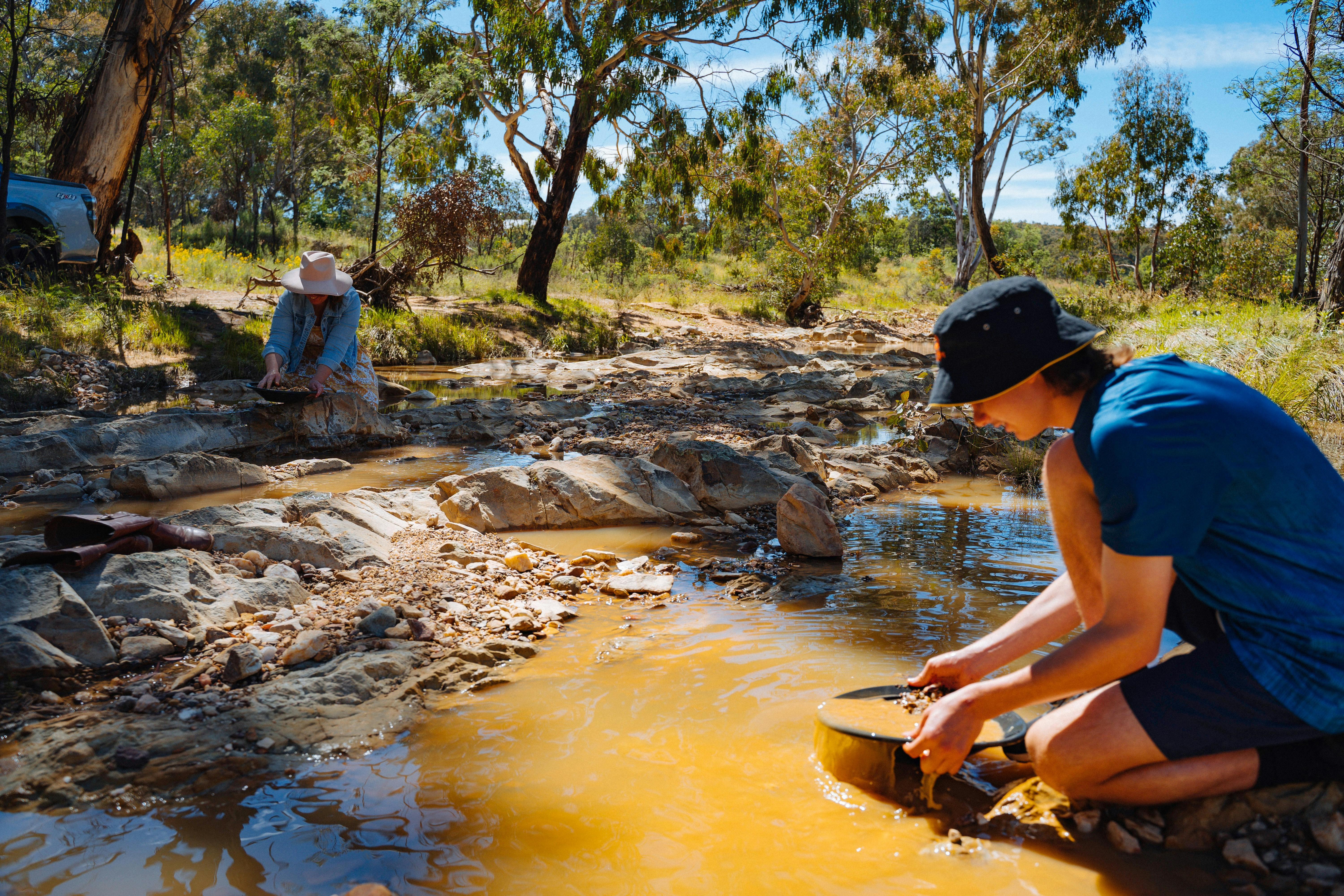 Boy Panning for gold in the Tambaroora Commons.