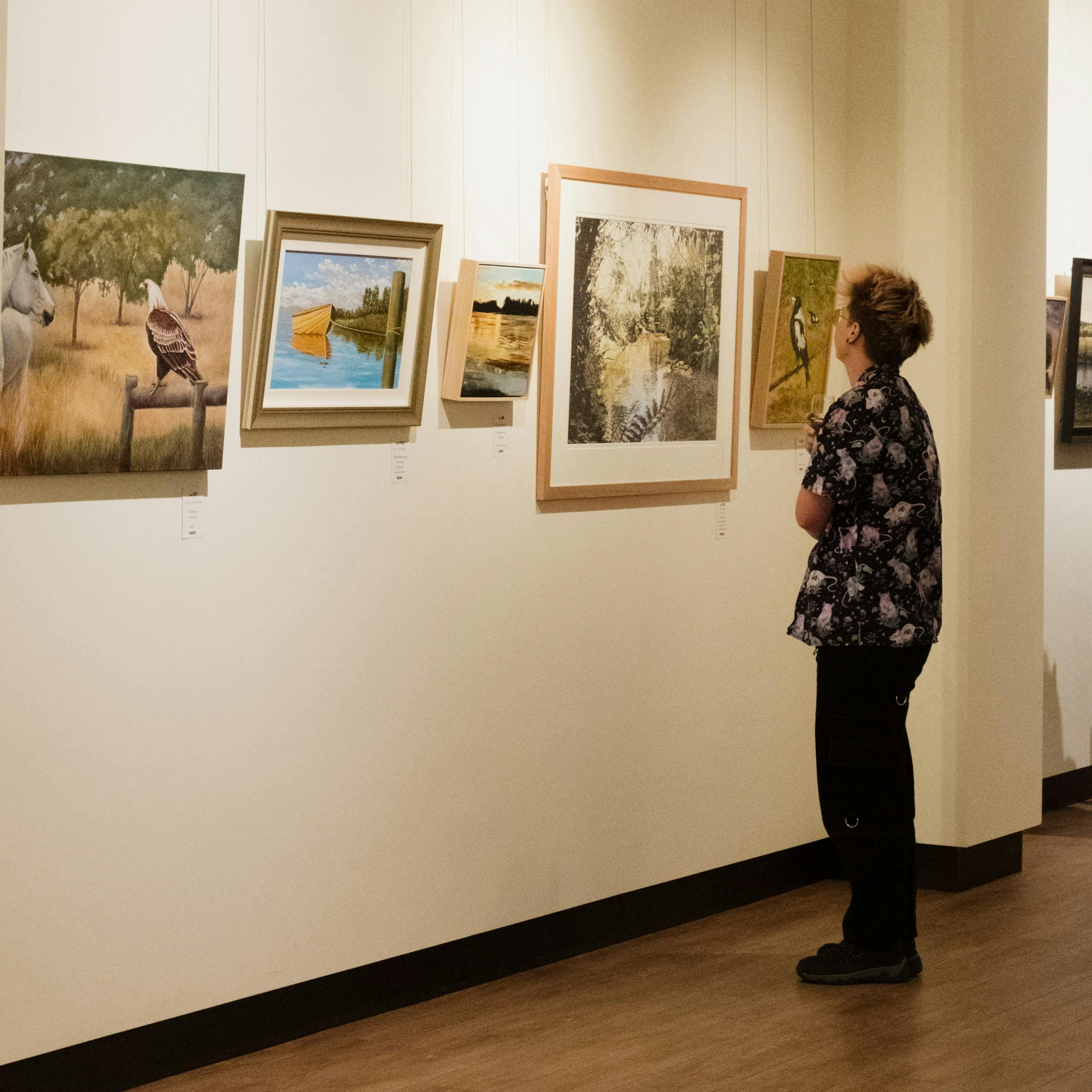 Person looking at art in gallery