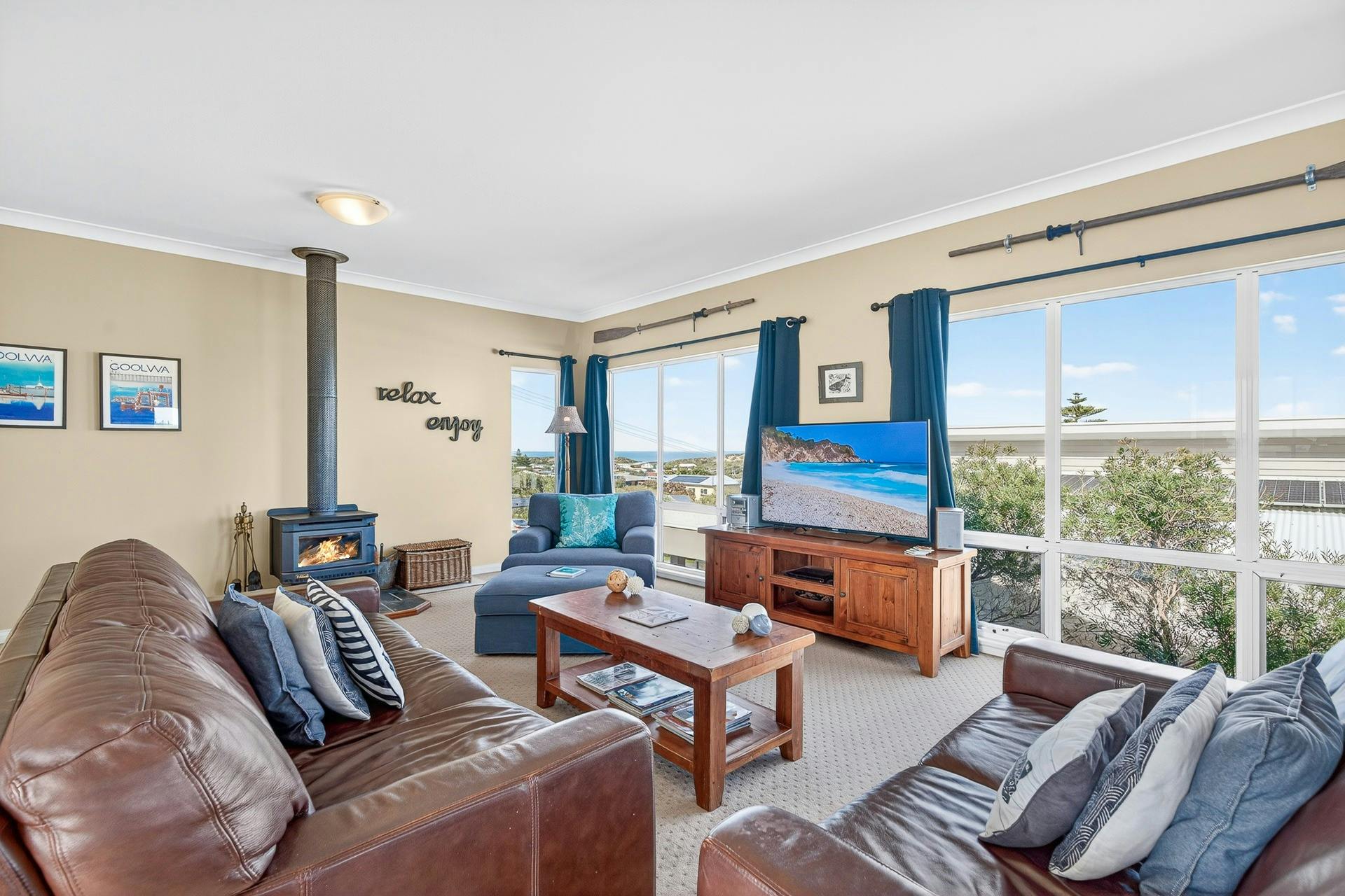 Coastal views, walk to beach, family entertainer