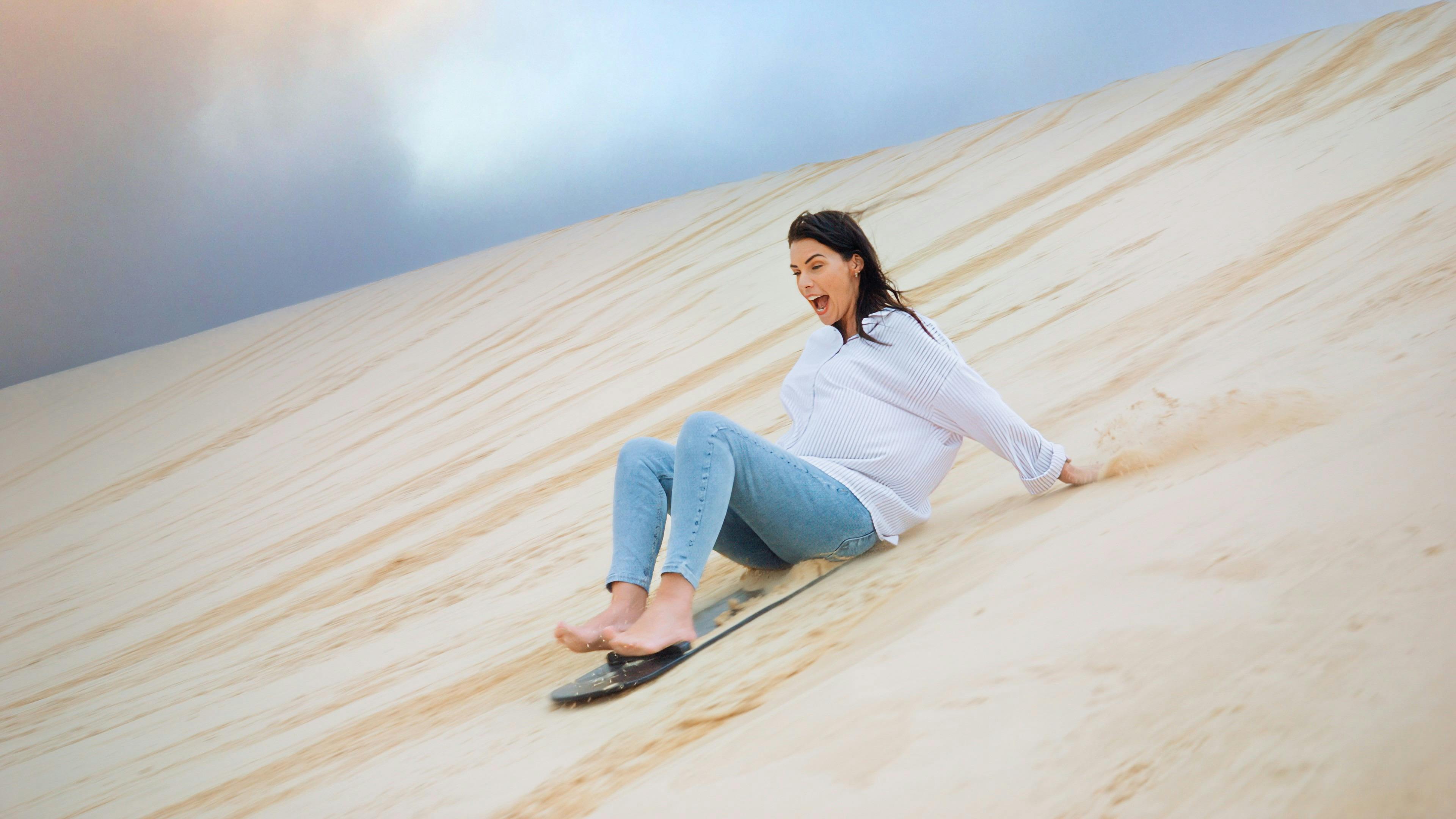 Woman Sandboarding