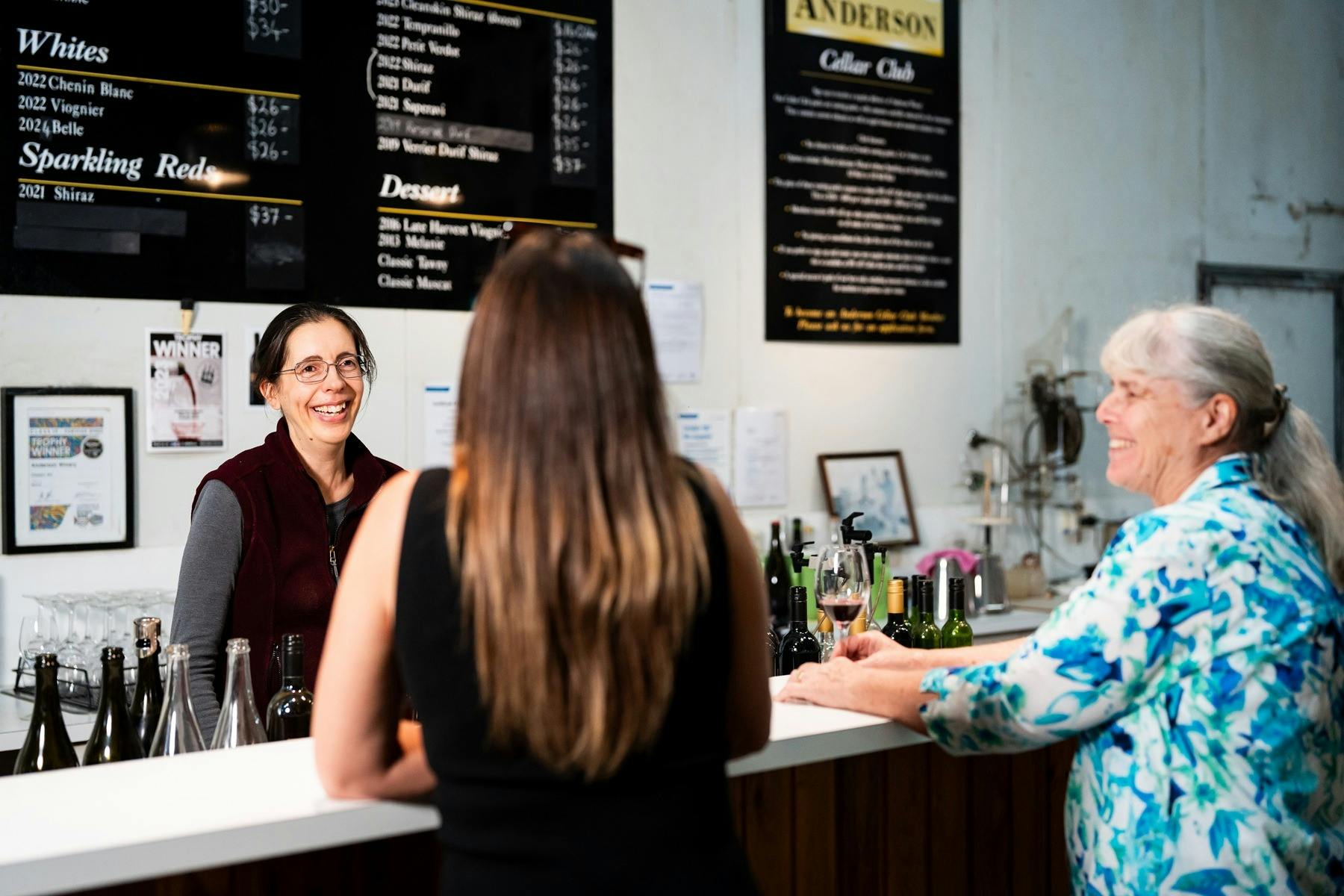 Christobelle Anderson serving customers at Anderson cellar door