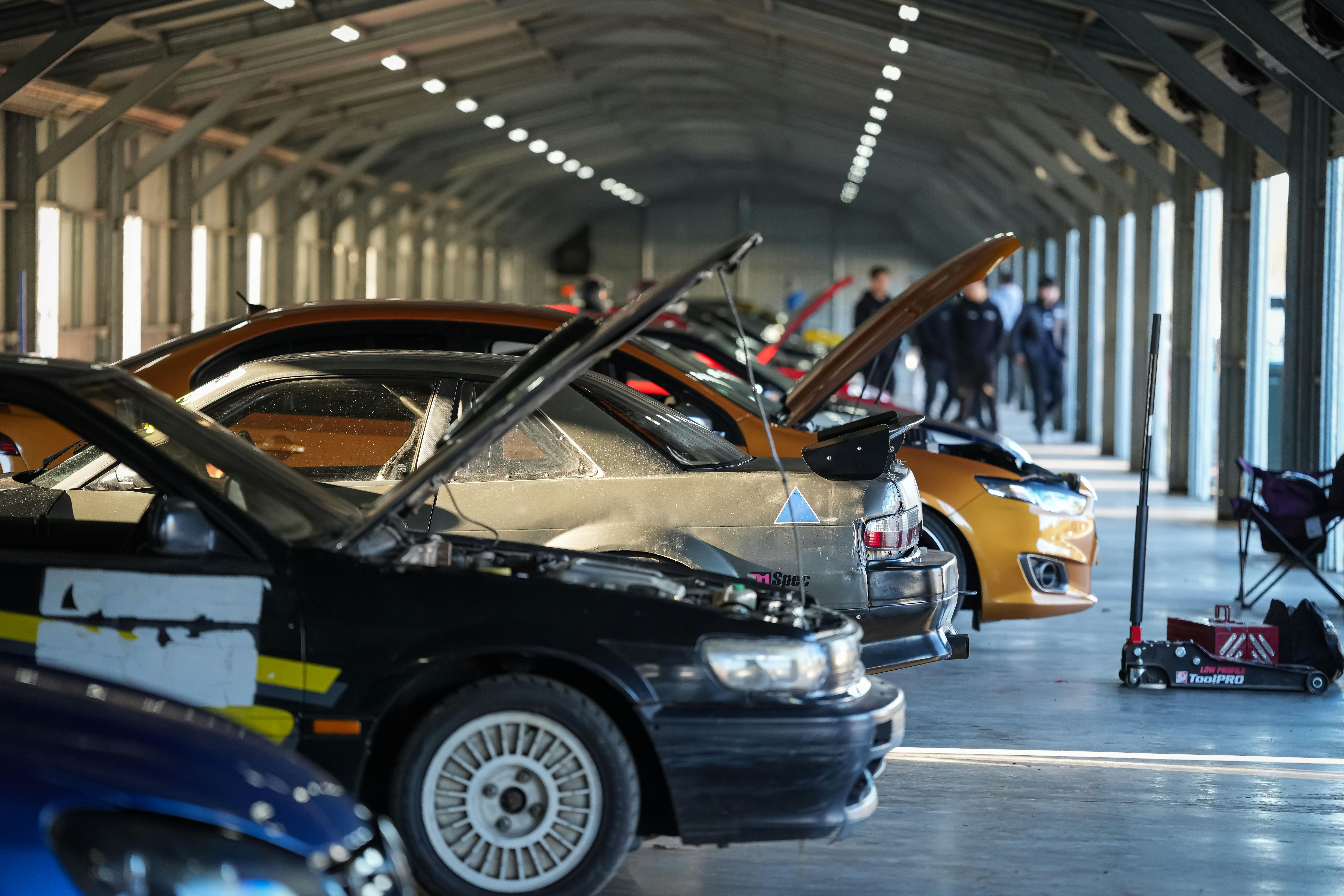 cars lined up in a garage at winton