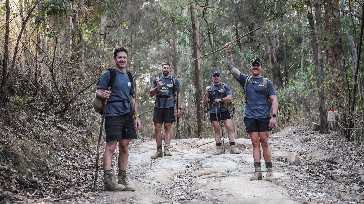 Team of males doing the Kokoda Challenge