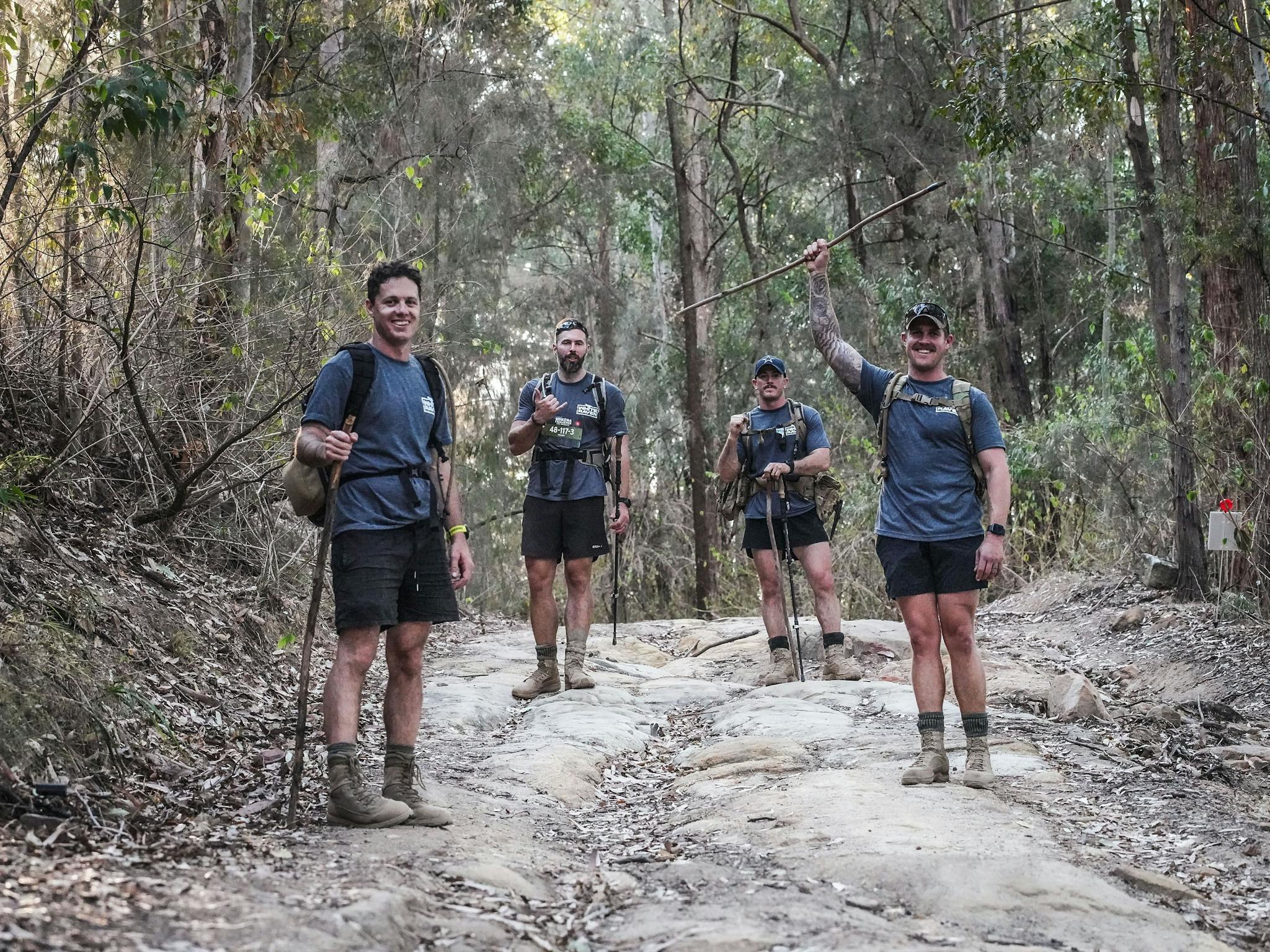 Team of males doing the Kokoda Challenge Team of males doing the Kokoda Challenge