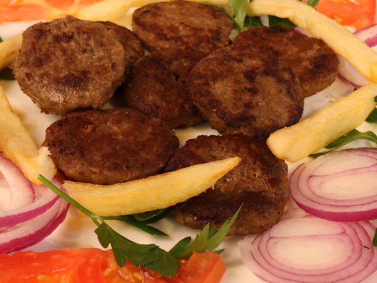 A plate with felafel and salad