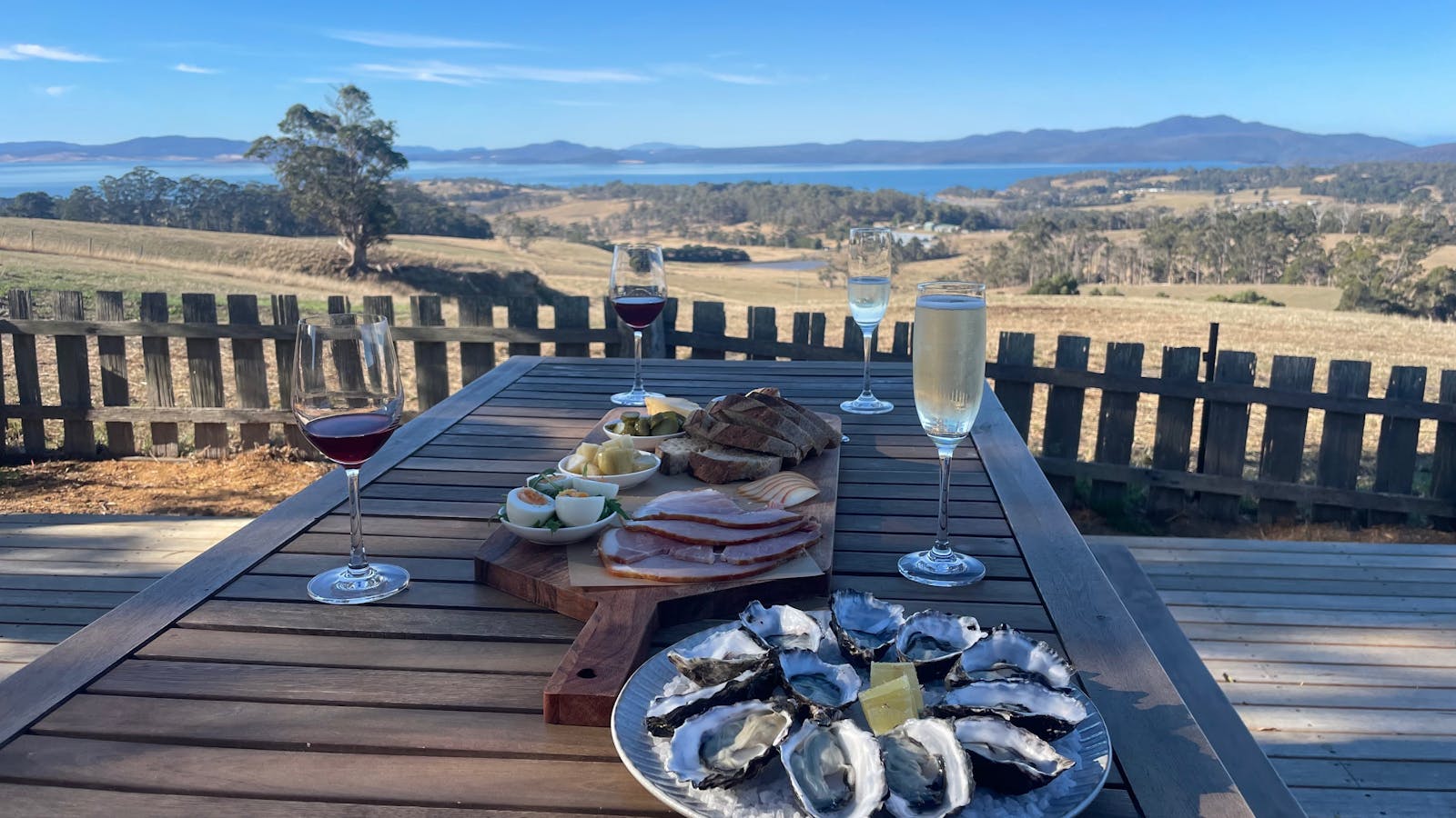 Wine and platters on the deck at the Premaydena Hill cellar door
