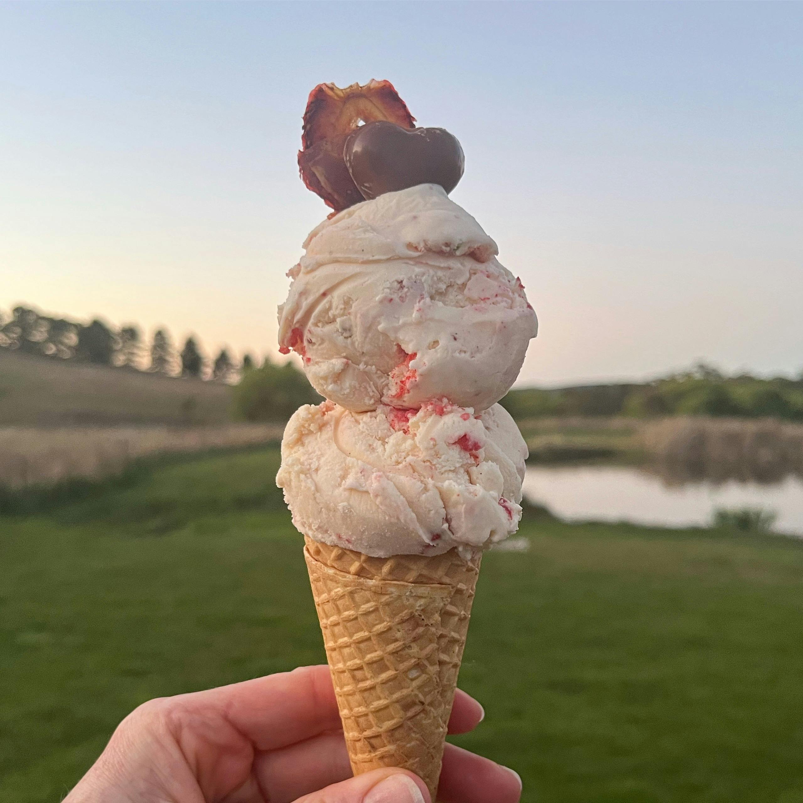 An ice-cream come with a sunset background