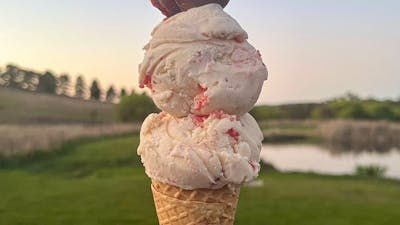 An ice-cream come with a sunset background