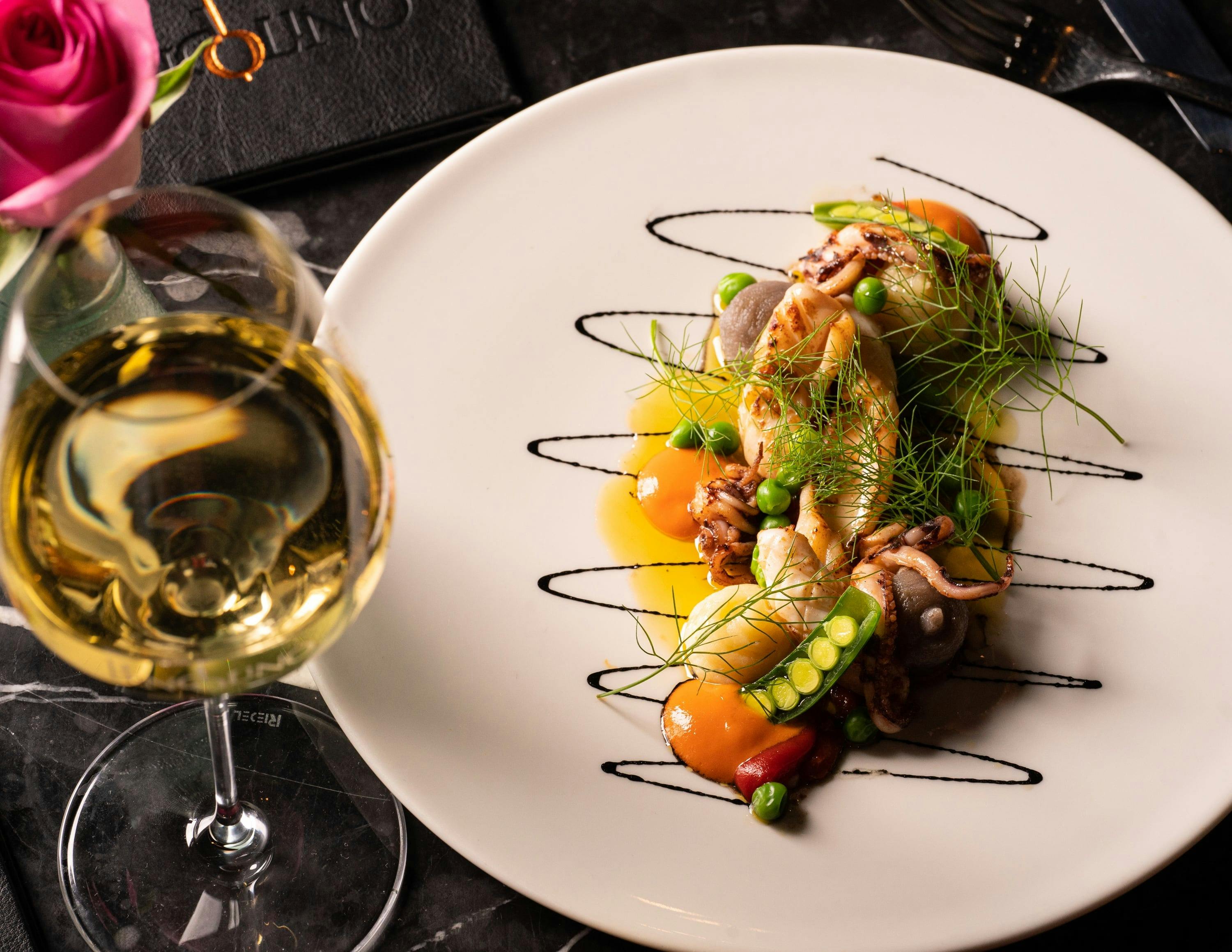 Hibachi Grilled Southern Calamari with Garlic Potato, Sweet Peas, Bell Pepper, Crustacean Oil